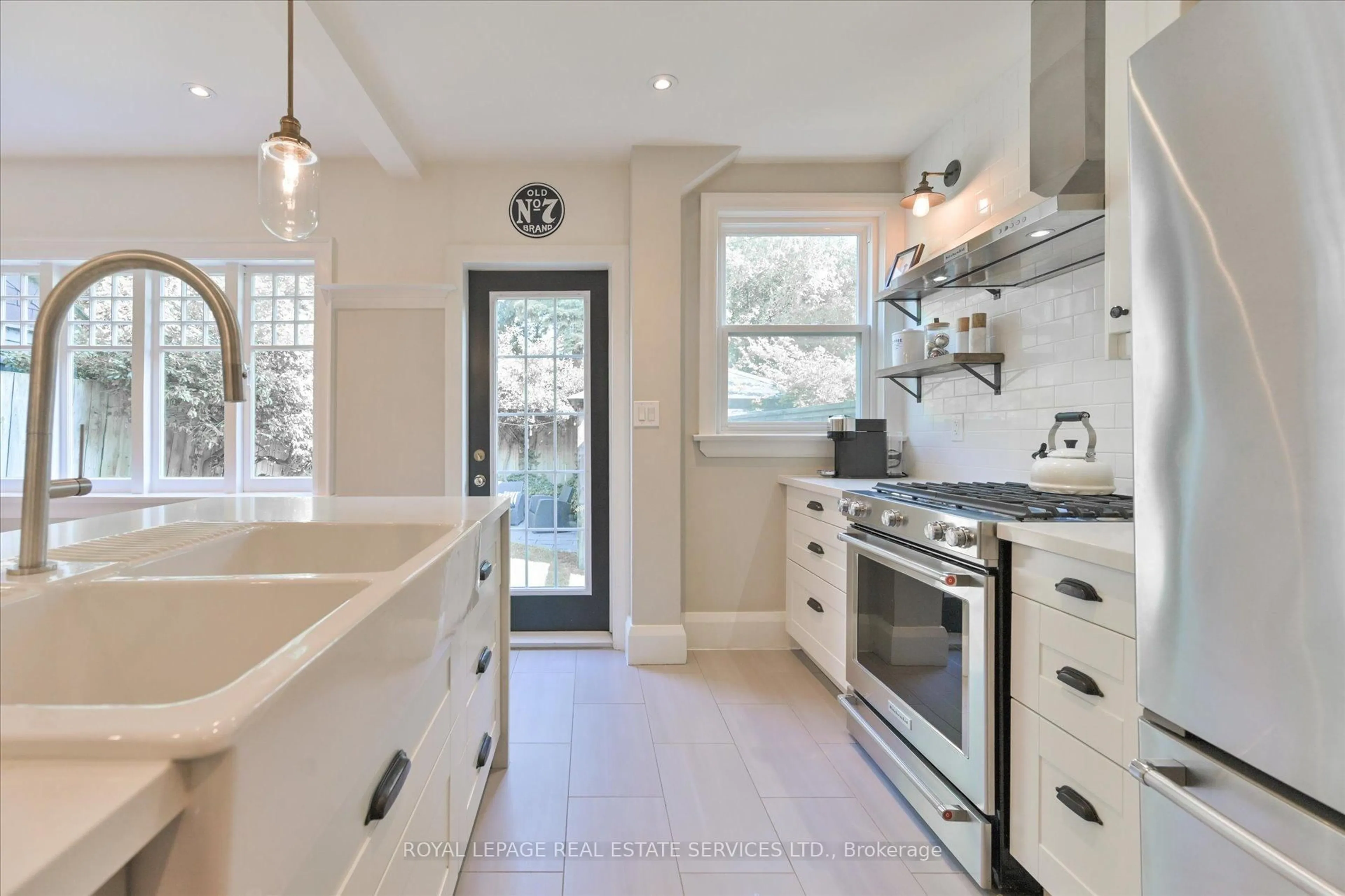 Open concept kitchen, ceramic/tile floor for 86 Ardagh St, Toronto Ontario M6S 1Y5