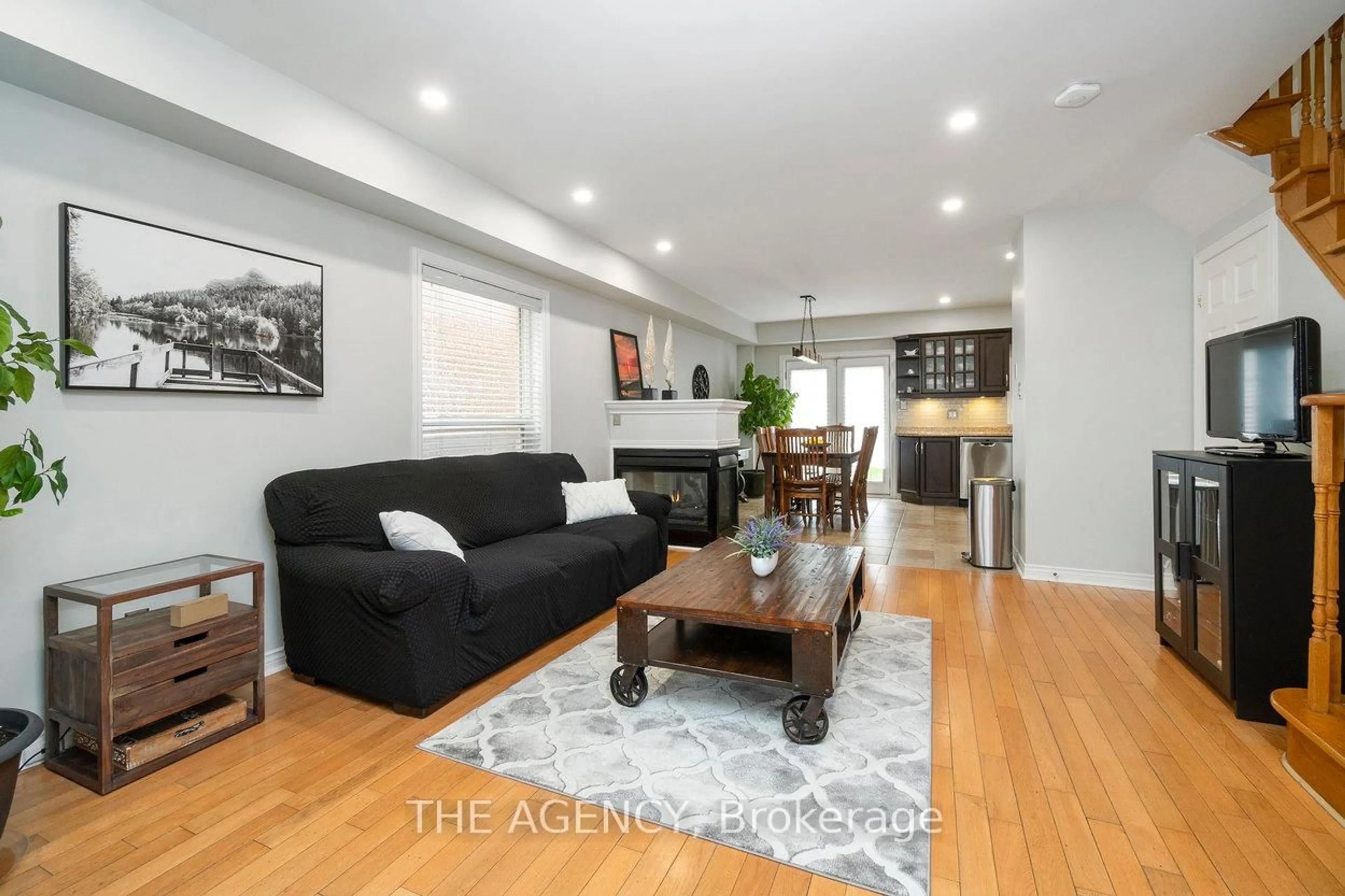 Living room with furniture, wood/laminate floor for 20 Highmore Ave, Caledon Ontario L7E 1V7