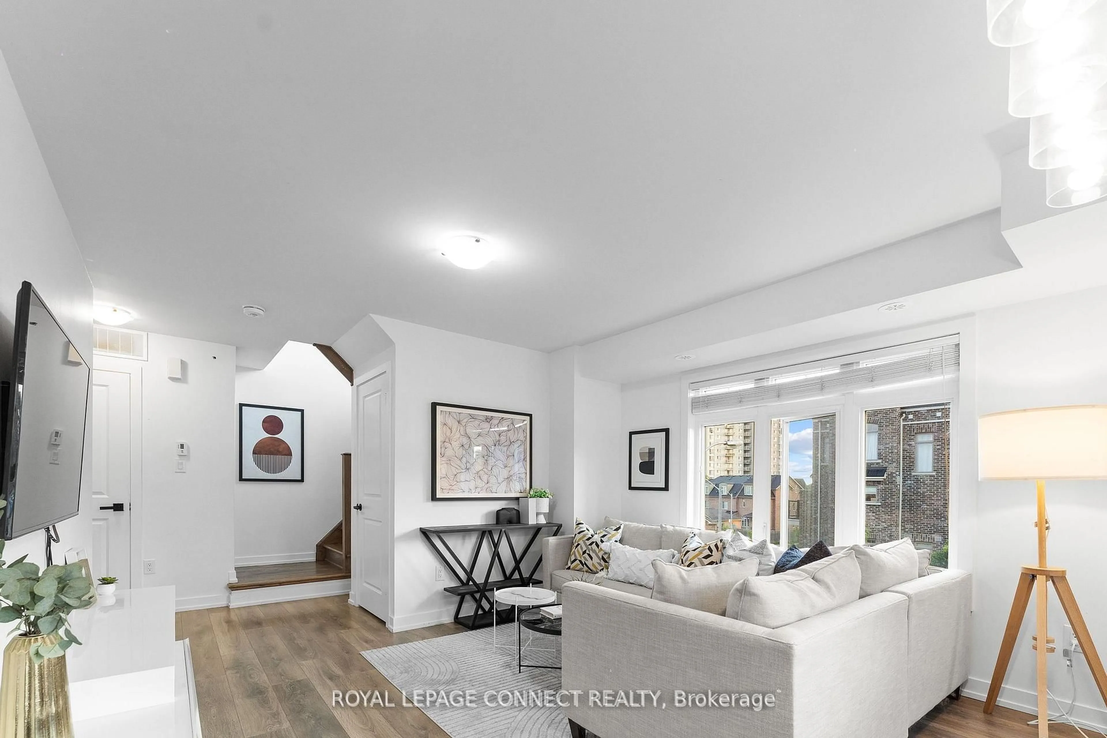 Living room with furniture, unknown for 80 Parrotta Dr #151, Toronto Ontario M9M 0B5