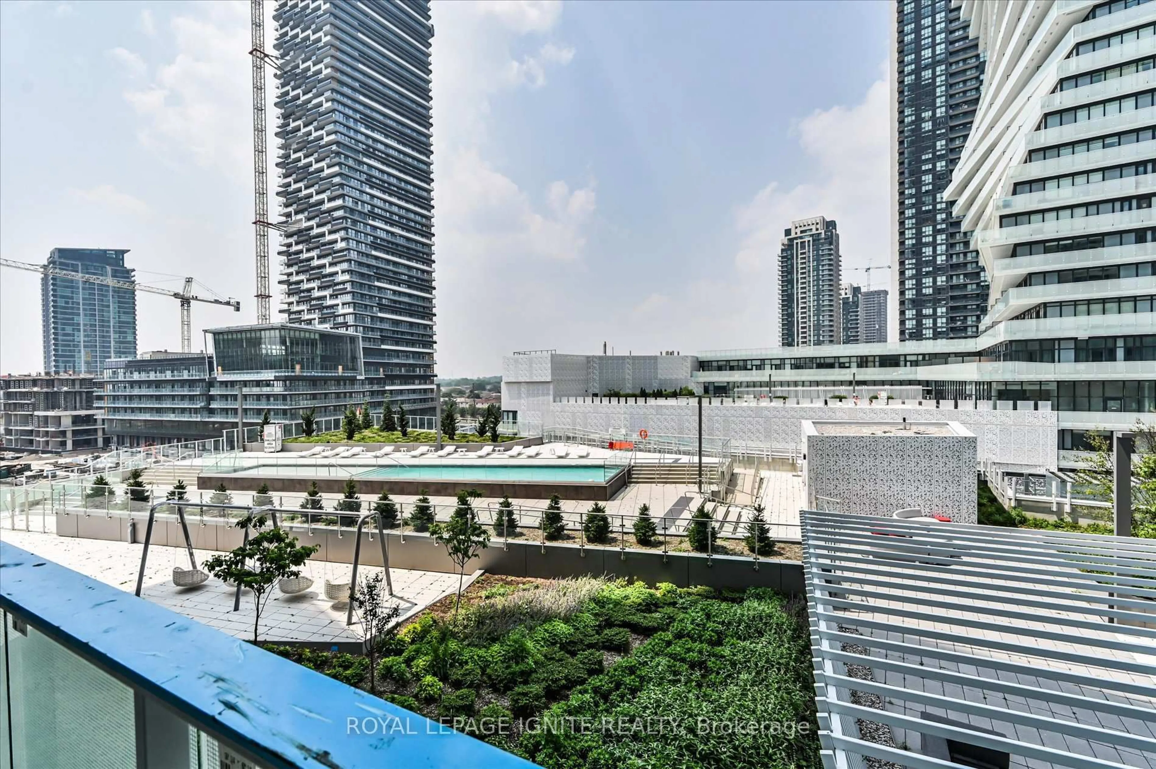 Patio, city buildings view from balcony for 3883 Quartz Rd #501, Mississauga Ontario L5B 0M4