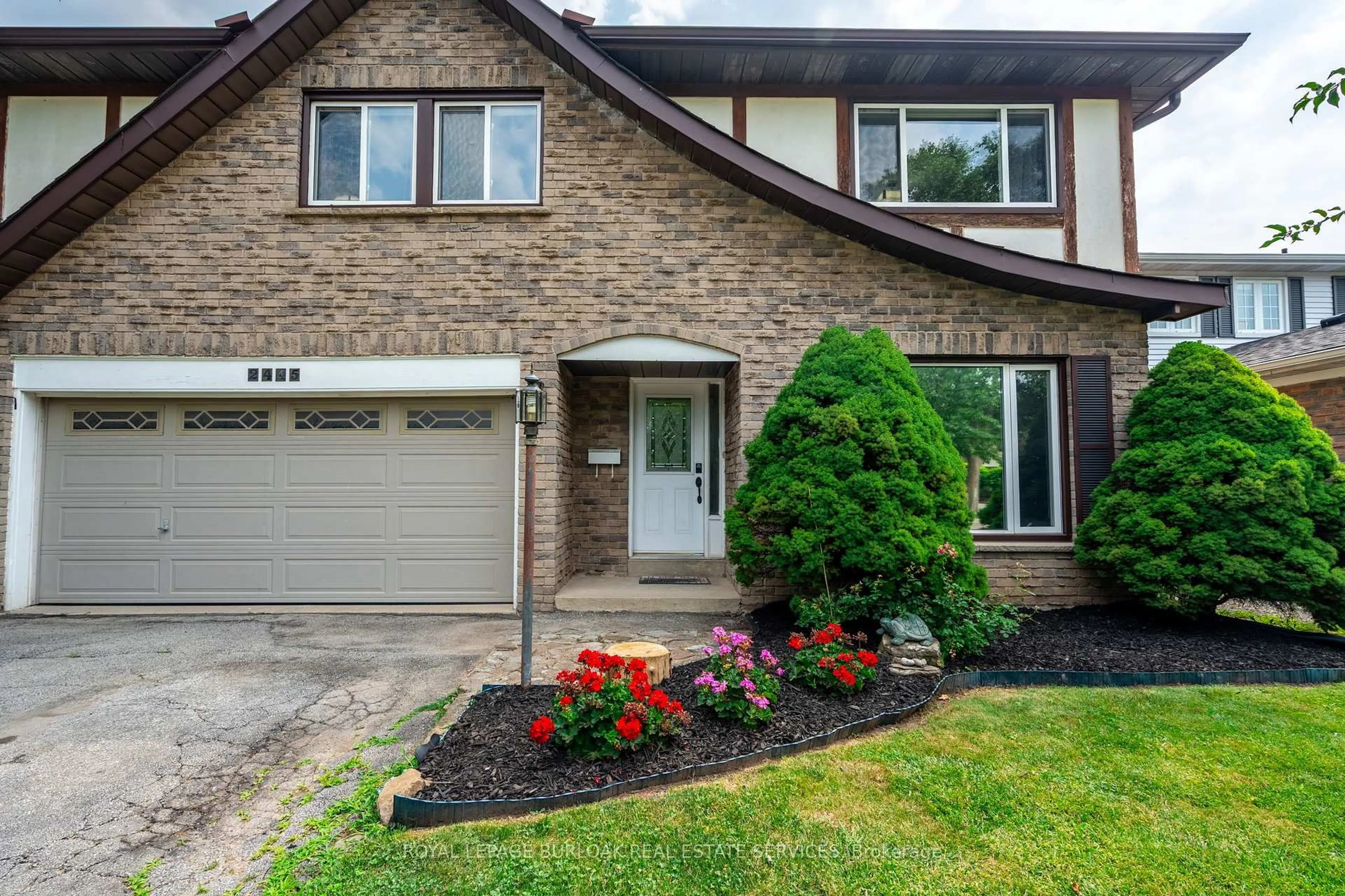 Home with brick exterior material, street for 2445 Cavendish Dr, Burlington Ontario L7P 3T7
