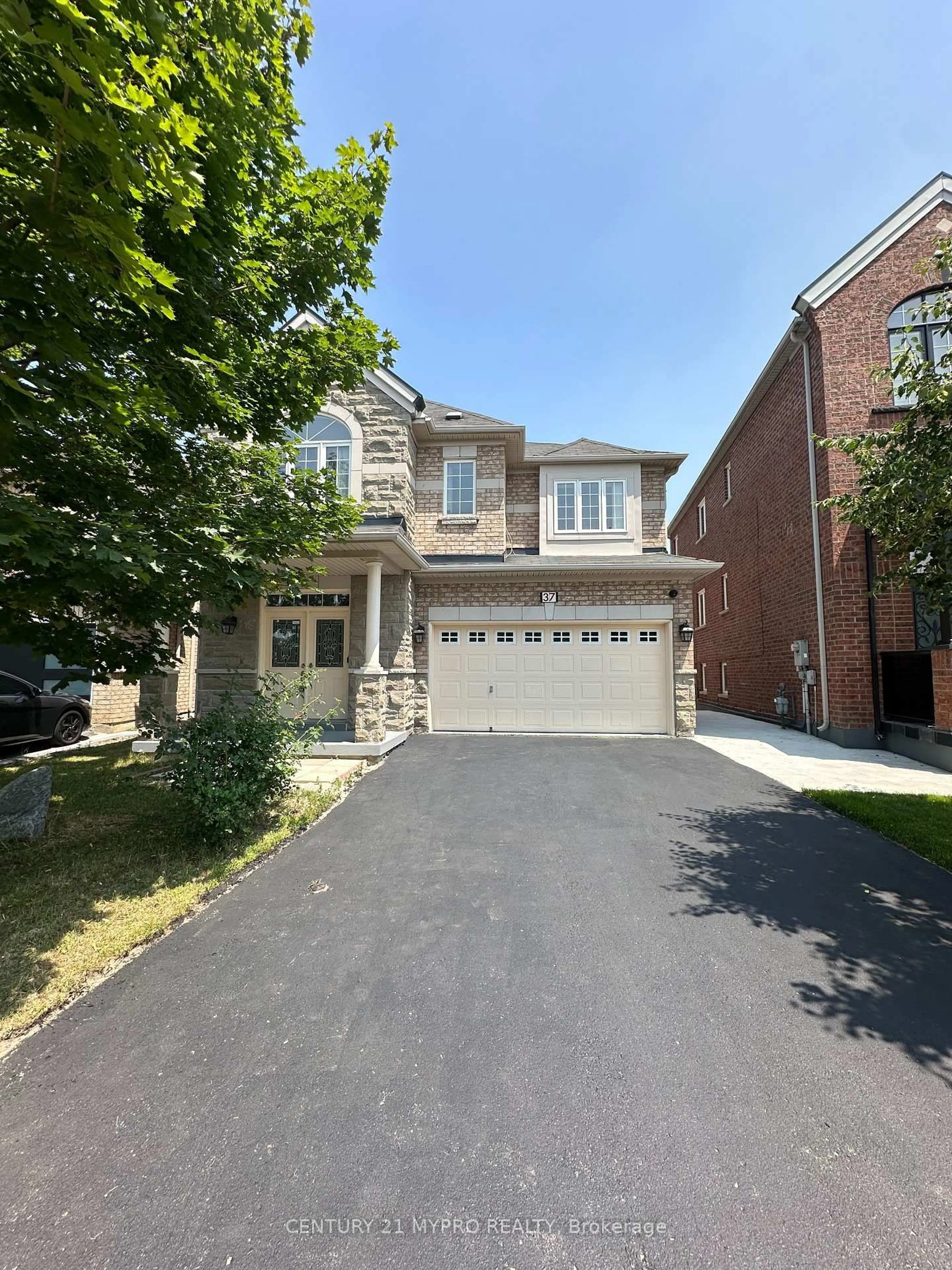 Home with brick exterior material, street for 37 Watchman Rd, Brampton Ontario L6P 2L6