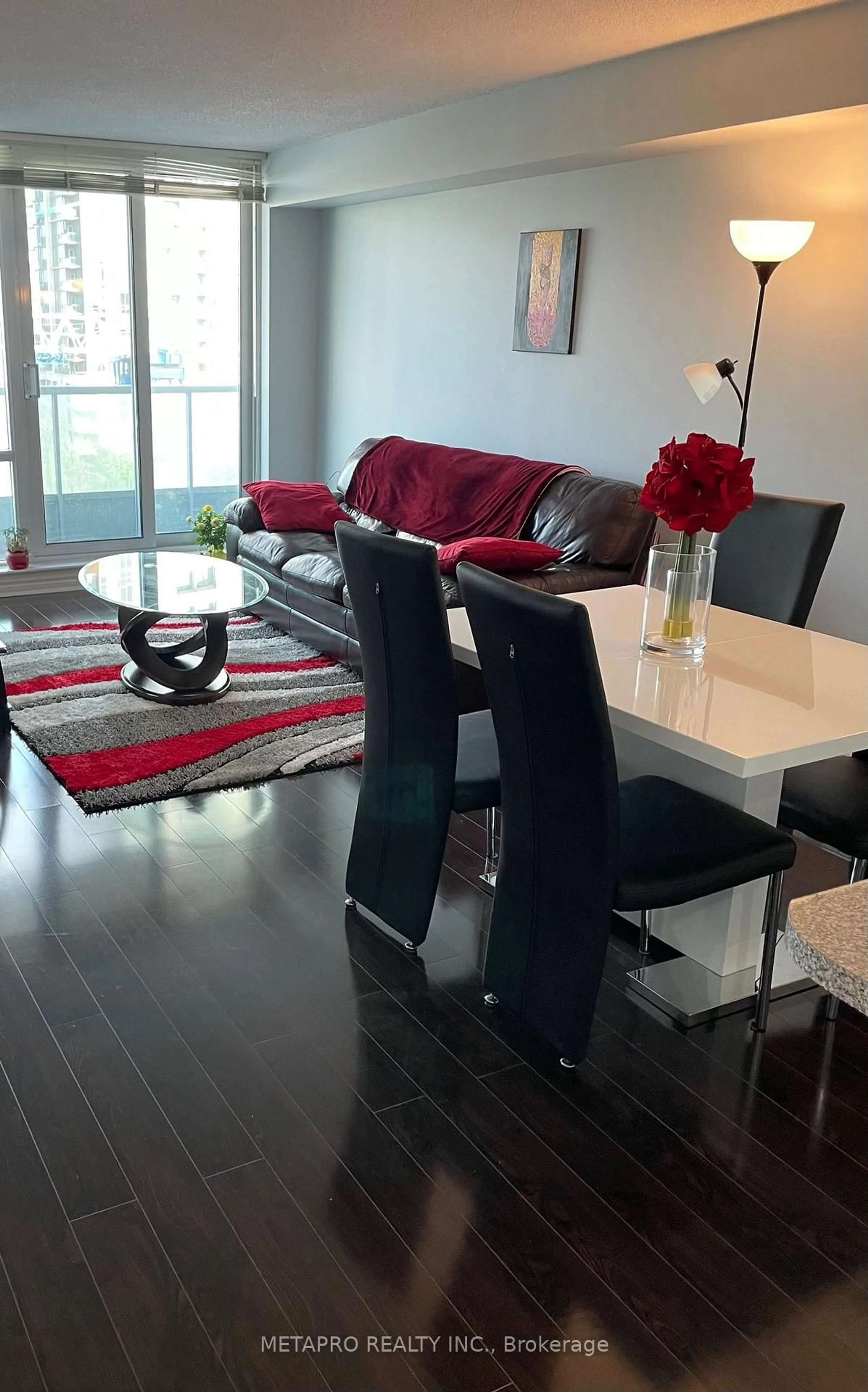 Living room with furniture, wood/laminate floor for 33 Elm Dr #813, Mississauga Ontario L5B 4M2