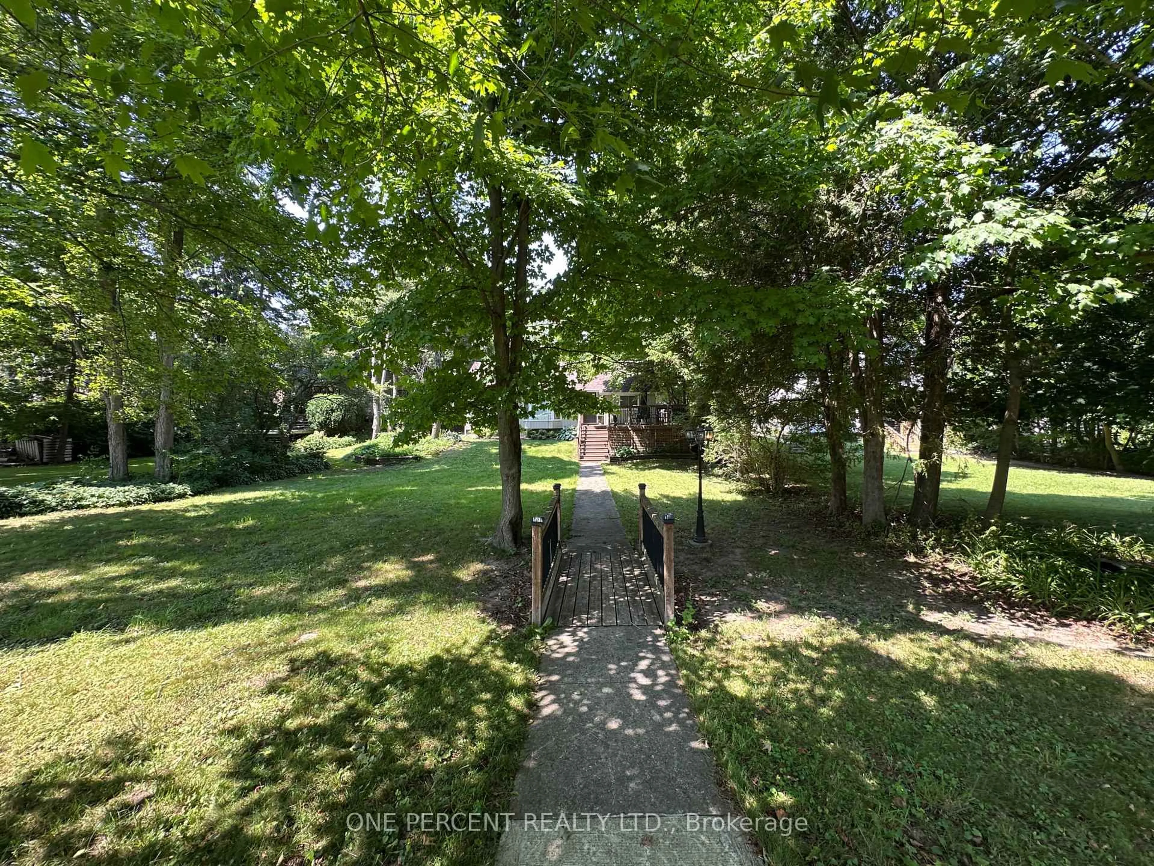 A pic from outside/outdoor area/front of a property/back of a property/a pic from drone, forest/trees view for 7 Second Ave, Orangeville Ontario L9W 1H4