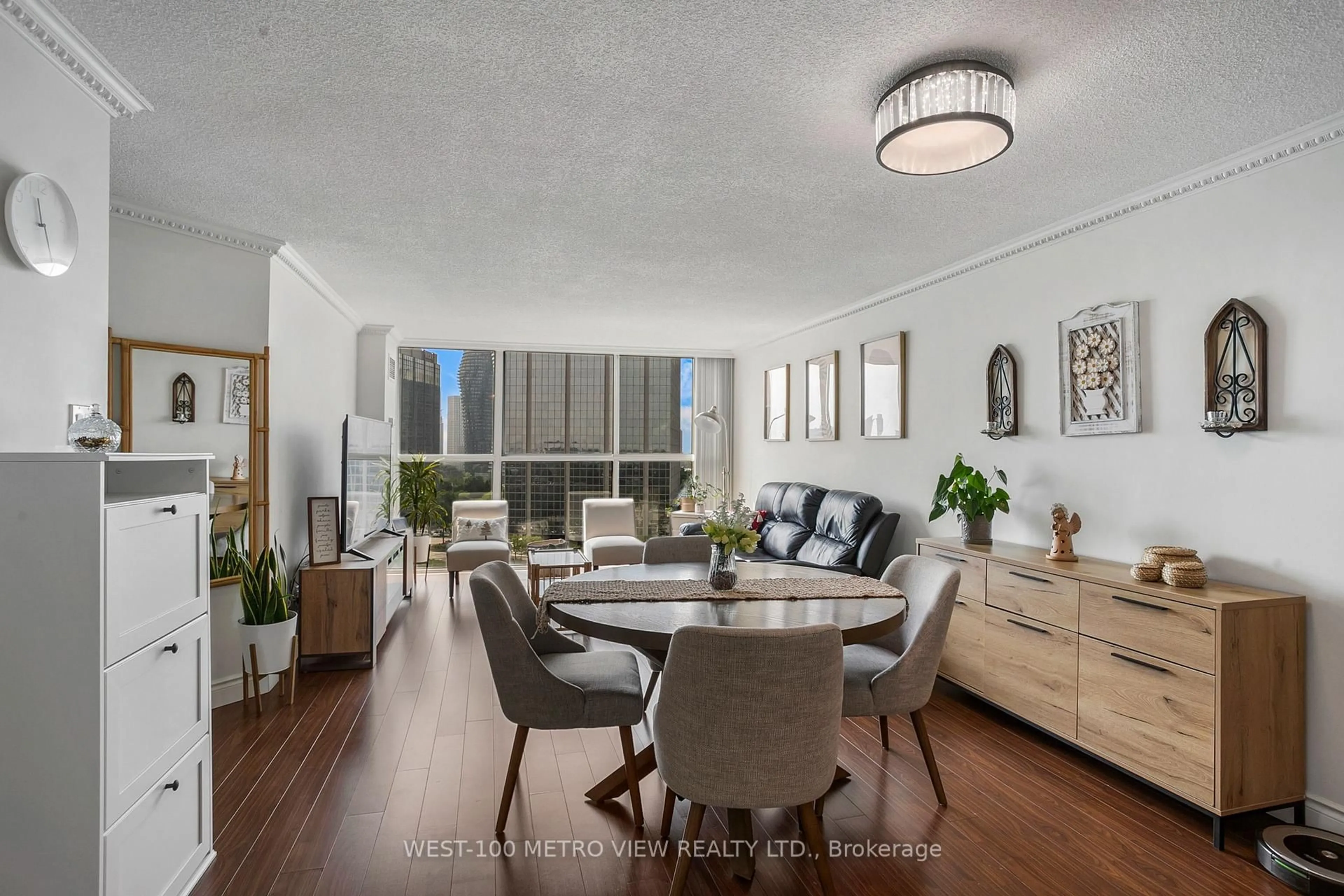 Living room with furniture, wood/laminate floor for 4185 Shipp Dr #818, Mississauga Ontario L4Z 2Y8
