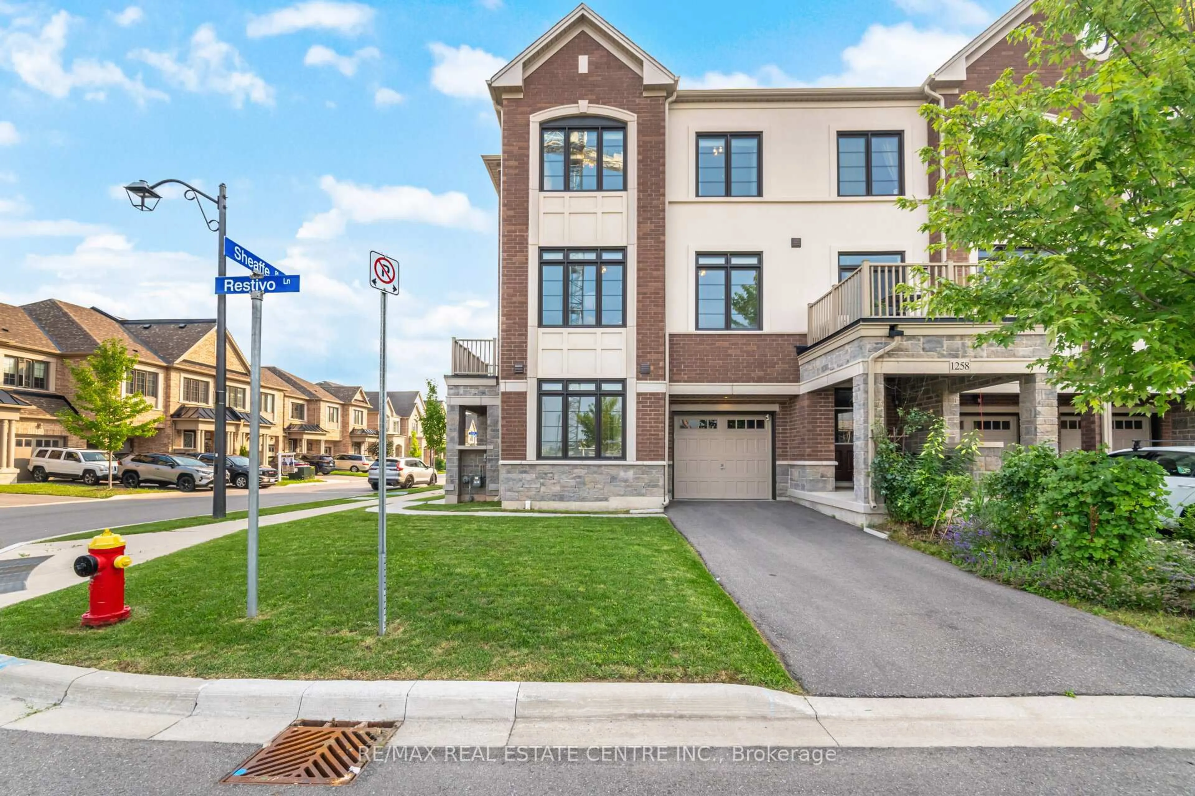 Home with brick exterior material, street for 1260 Restivo Lane, Milton Ontario L9E 1J9