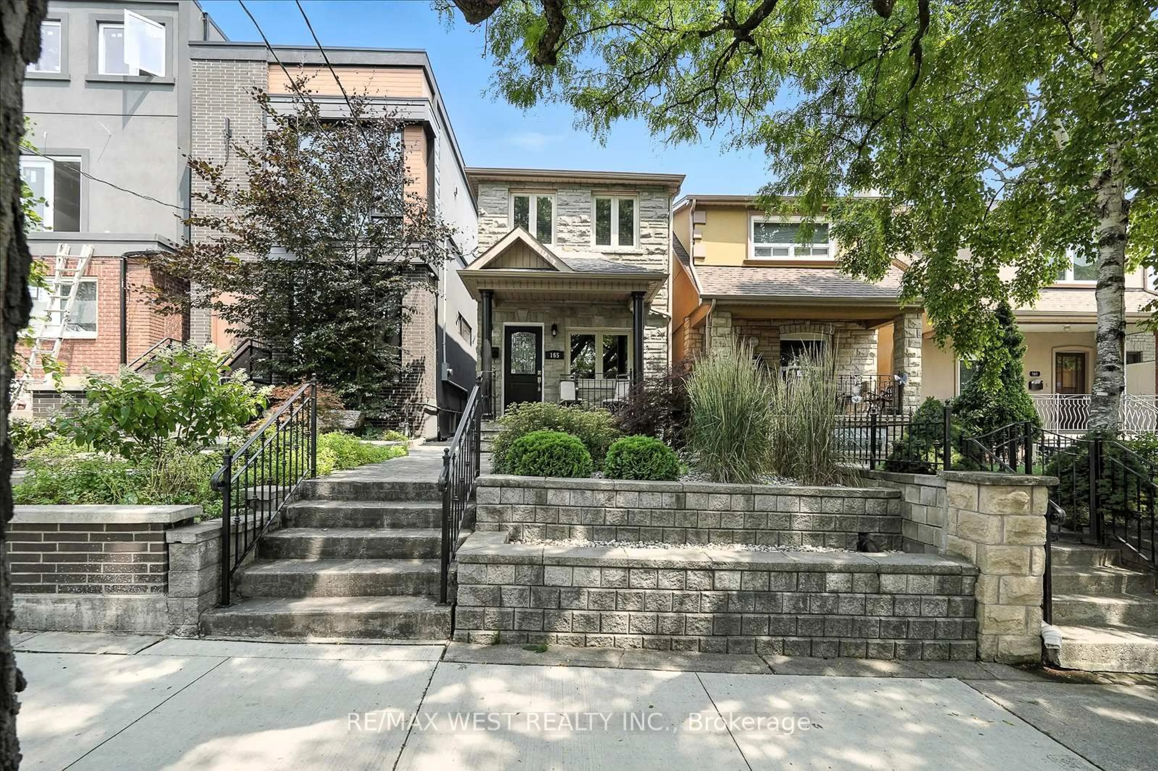 Home with brick exterior material, street for 165 Caledonia Rd, Toronto Ontario M6E 4S8