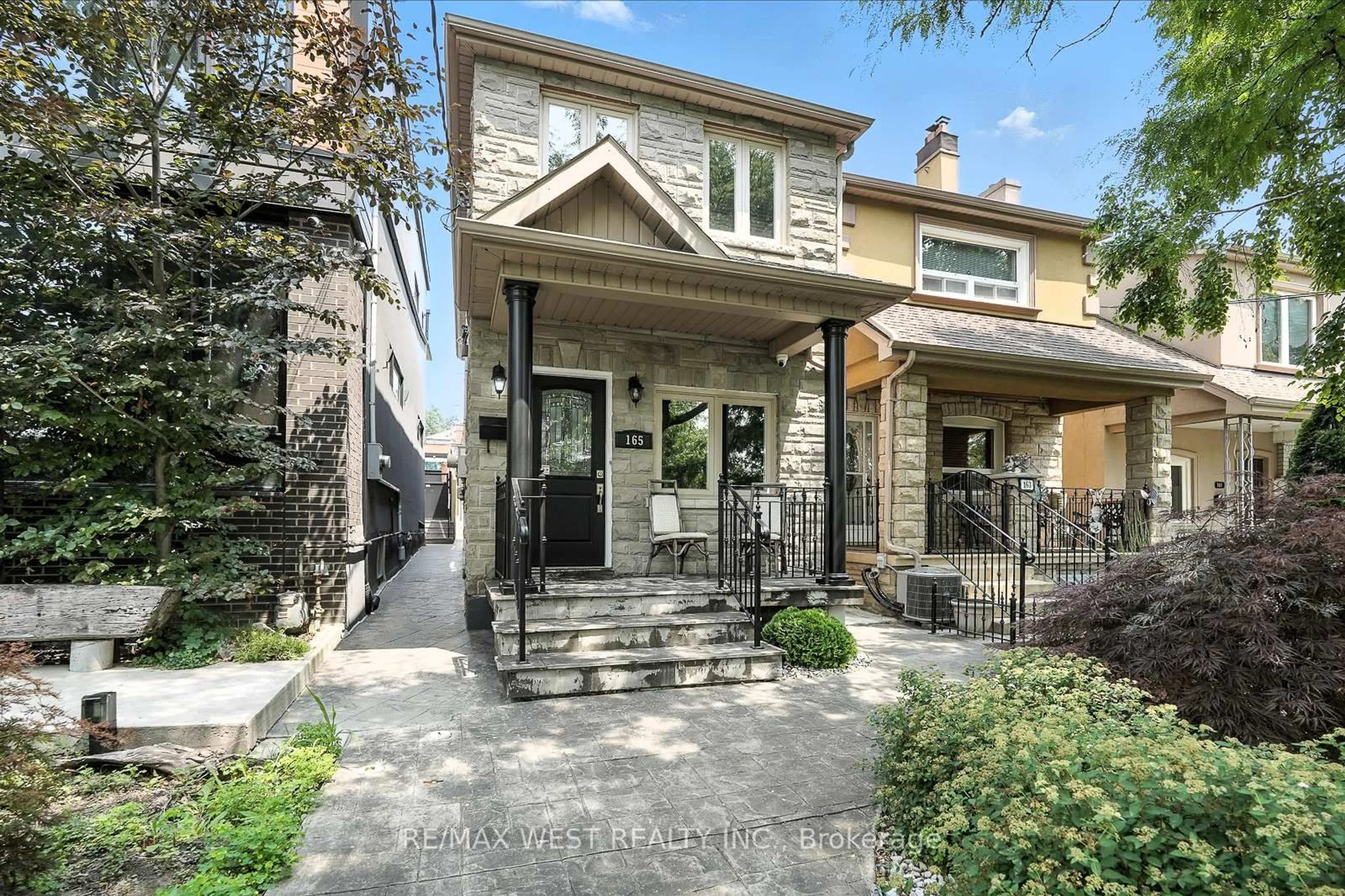 Home with brick exterior material, street for 165 Caledonia Rd, Toronto Ontario M6E 4S8