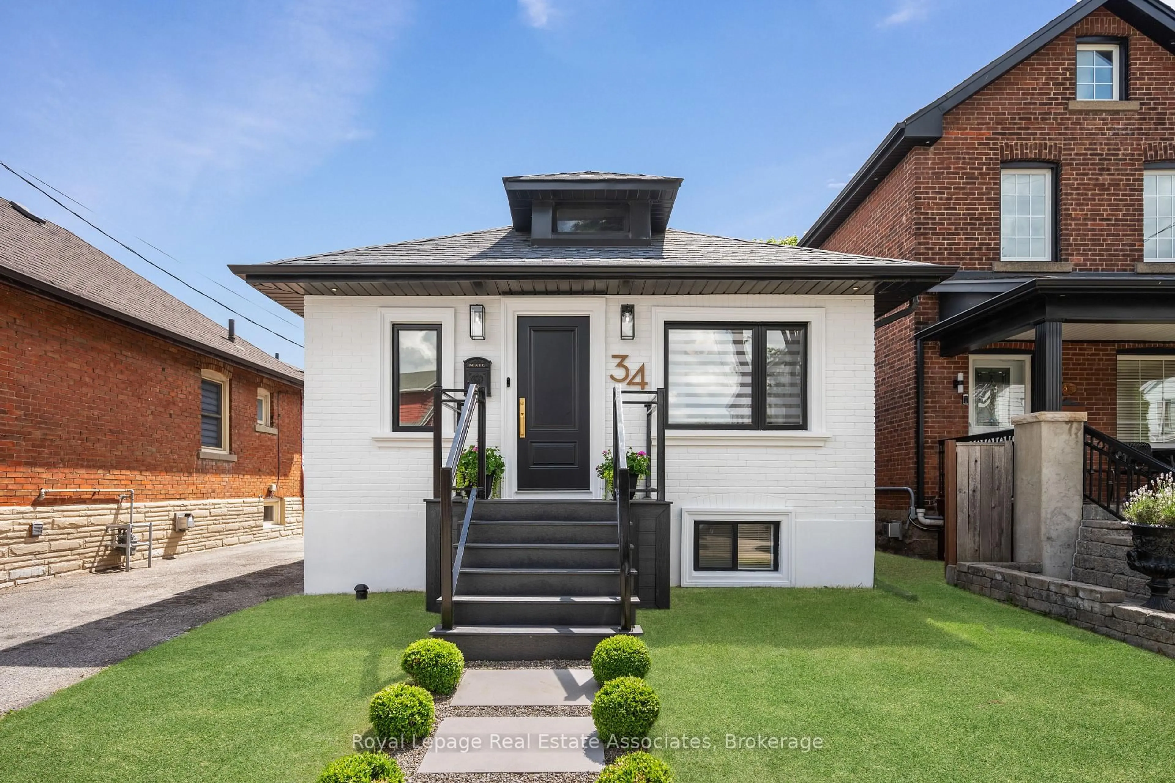 Home with brick exterior material, street for 34 Holley Ave, Toronto Ontario M9N 2C5