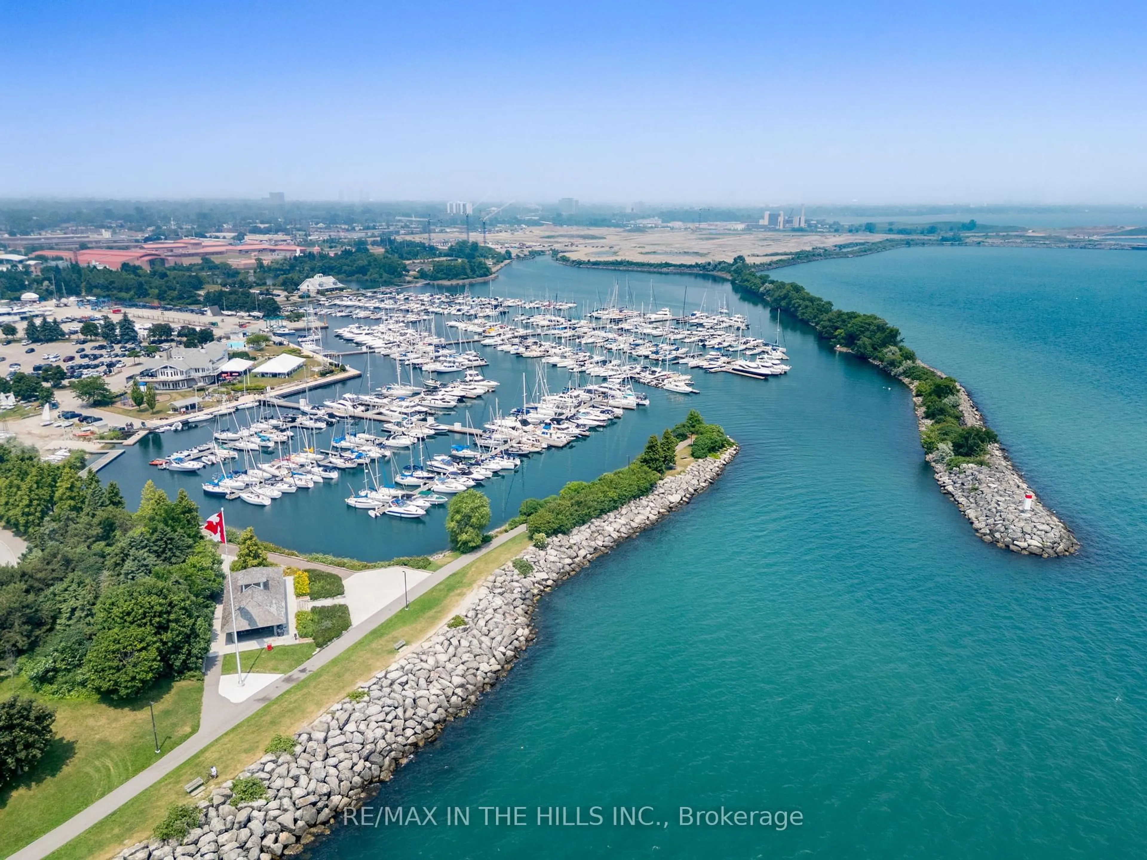 A pic from outside/outdoor area/front of a property/back of a property/a pic from drone, water/lake/river/ocean view for 1133 Beachcomber Rd, Mississauga Ontario L5G 0B4