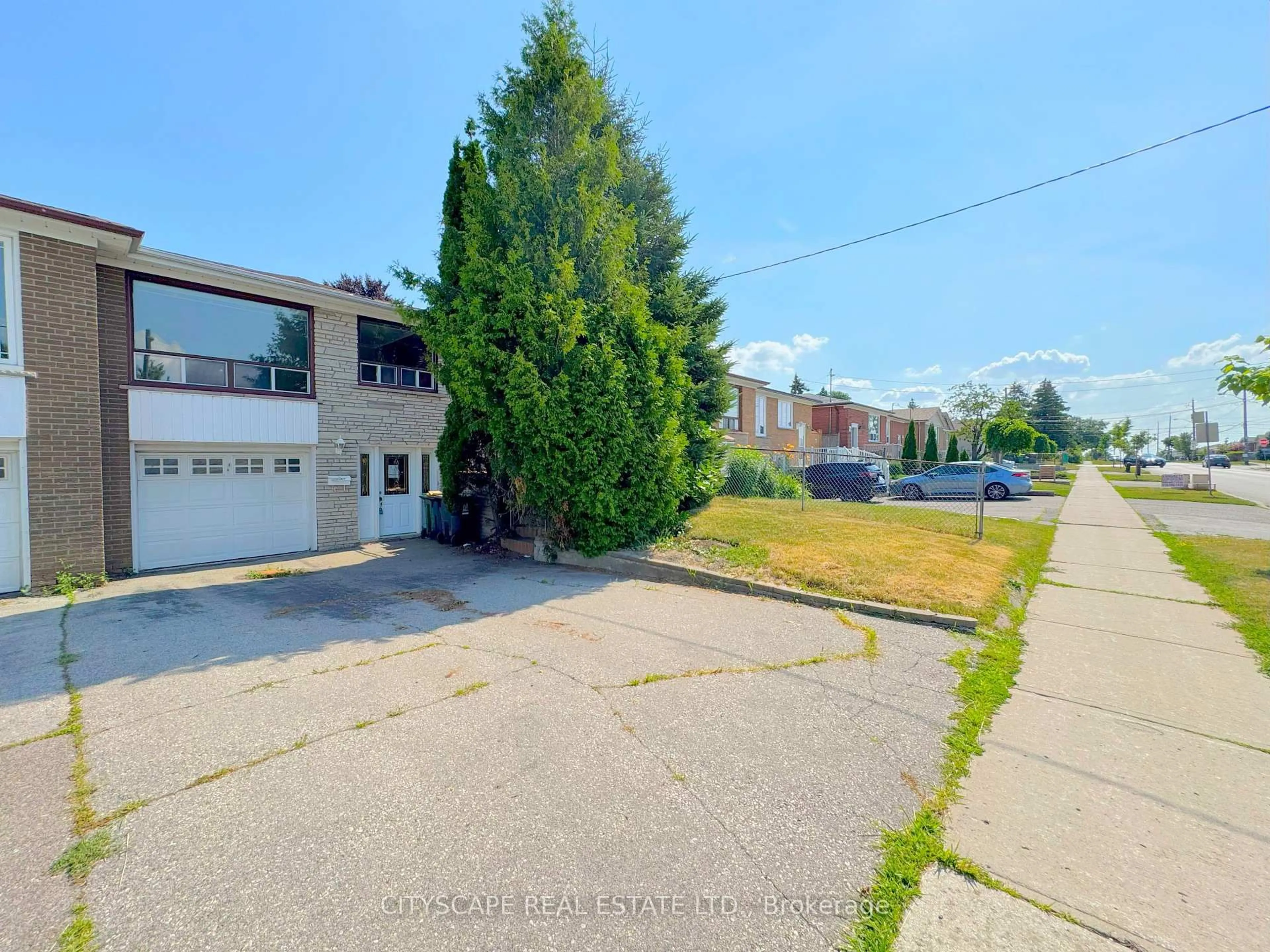 A pic from outside/outdoor area/front of a property/back of a property/a pic from drone, street for 113 Spenvalley Dr, Toronto Ontario M3L 1Z4