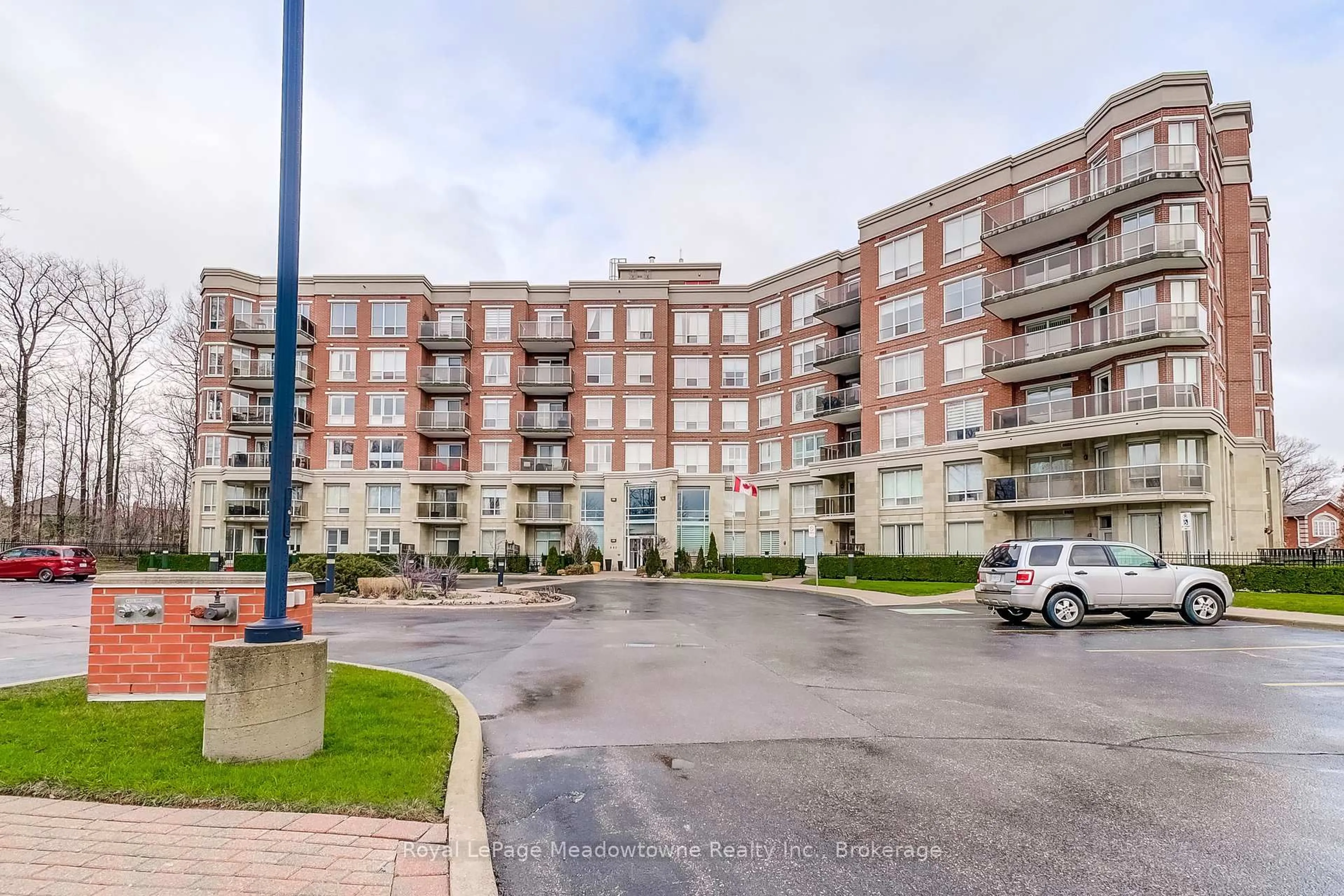 A pic from outside/outdoor area/front of a property/back of a property/a pic from drone, unknown for 483 Faith Dr #410, Mississauga Ontario L5R 0A1