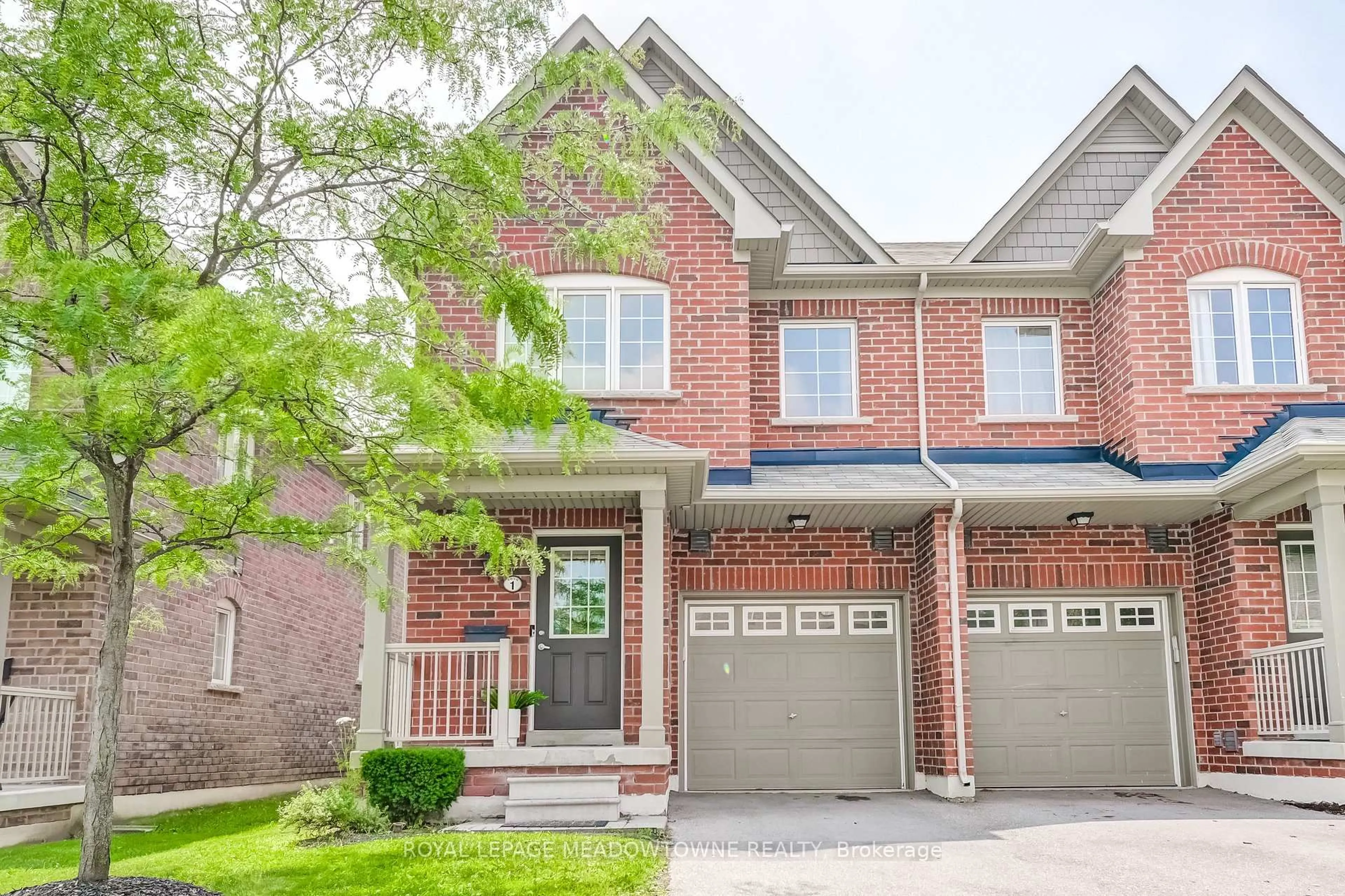 Home with brick exterior material, street for 5050 Harvard Rd #1, Mississauga Ontario L5M 0X1