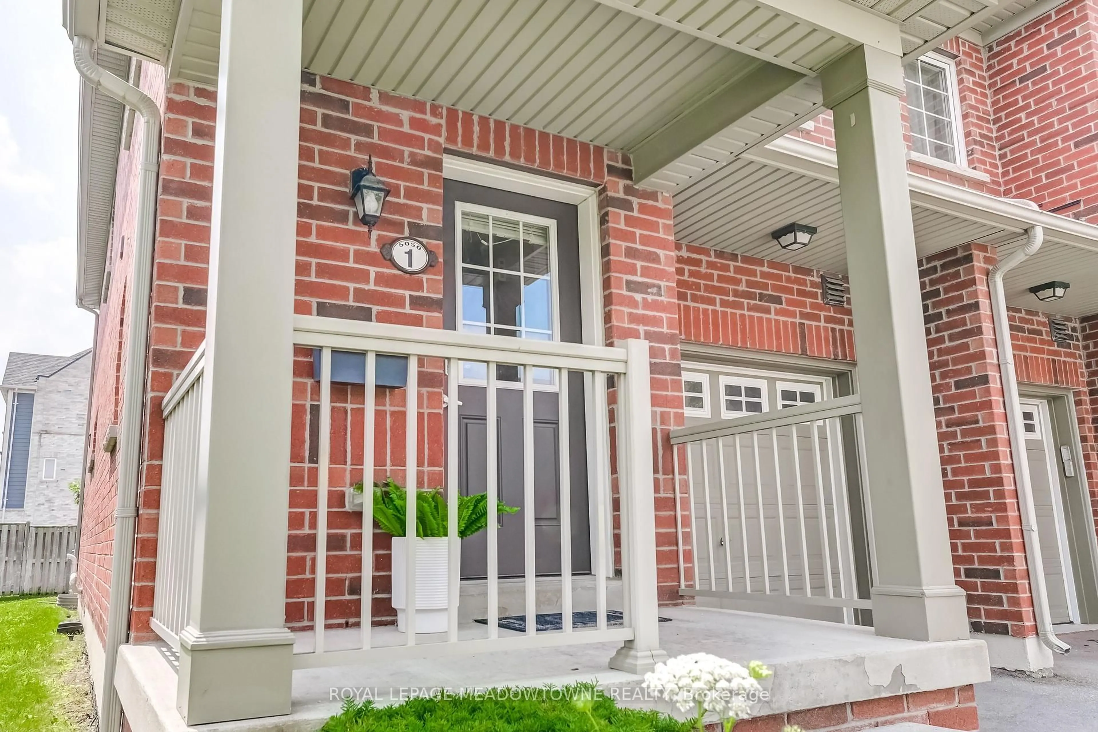 Home with brick exterior material, street for 5050 Harvard Rd #1, Mississauga Ontario L5M 0X1