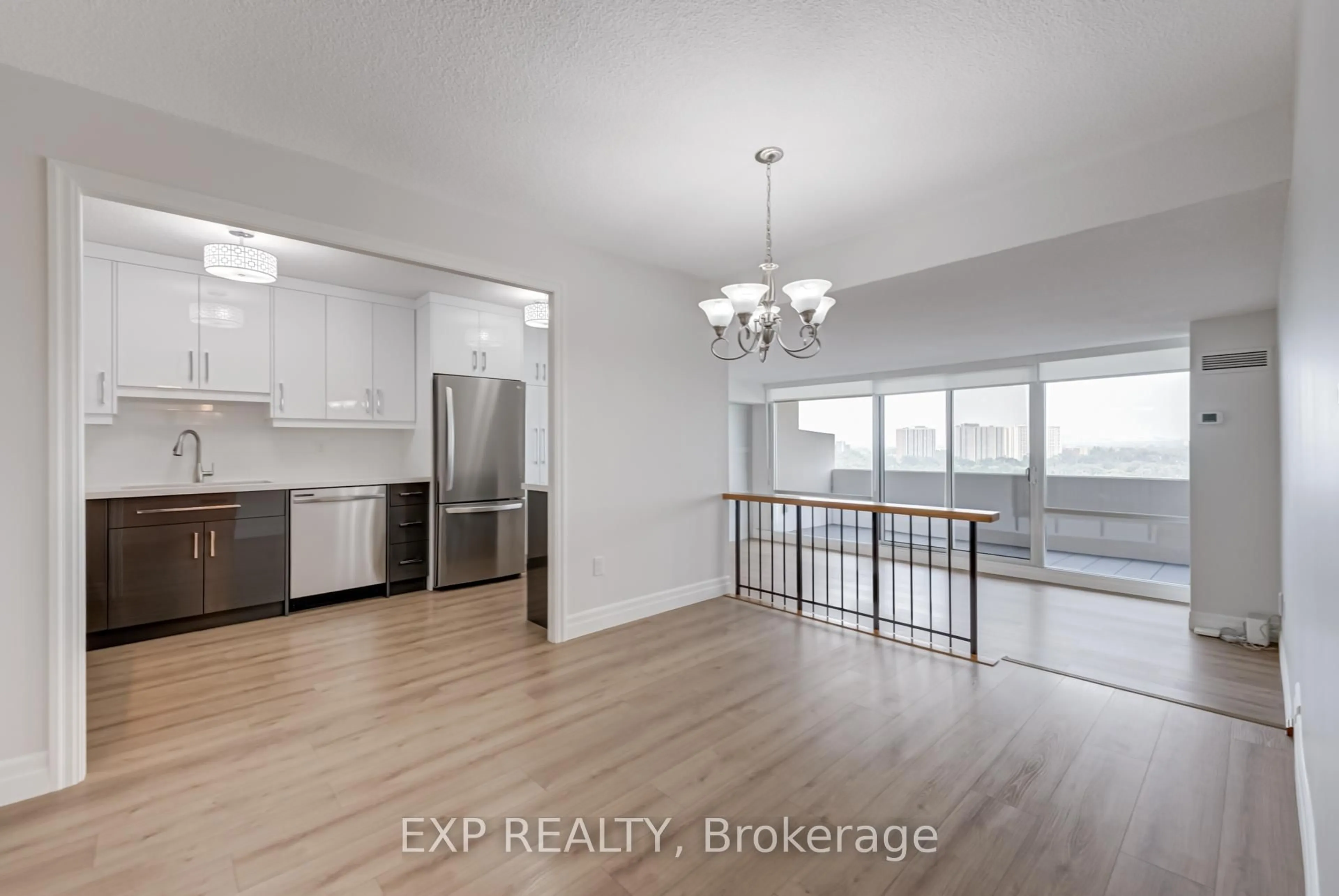 Open concept kitchen, wood/laminate floor for 270 Scarlett Rd #1812, Toronto Ontario M6N 4X7