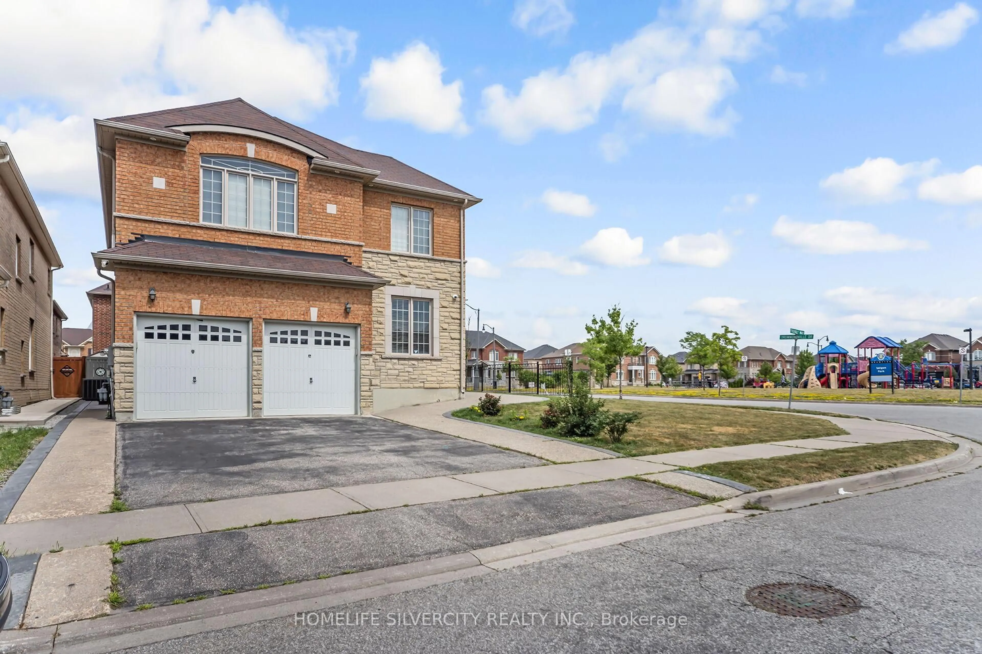 Home with brick exterior material, street for 26 Drummondville Dr, Brampton Ontario L6P 3M9
