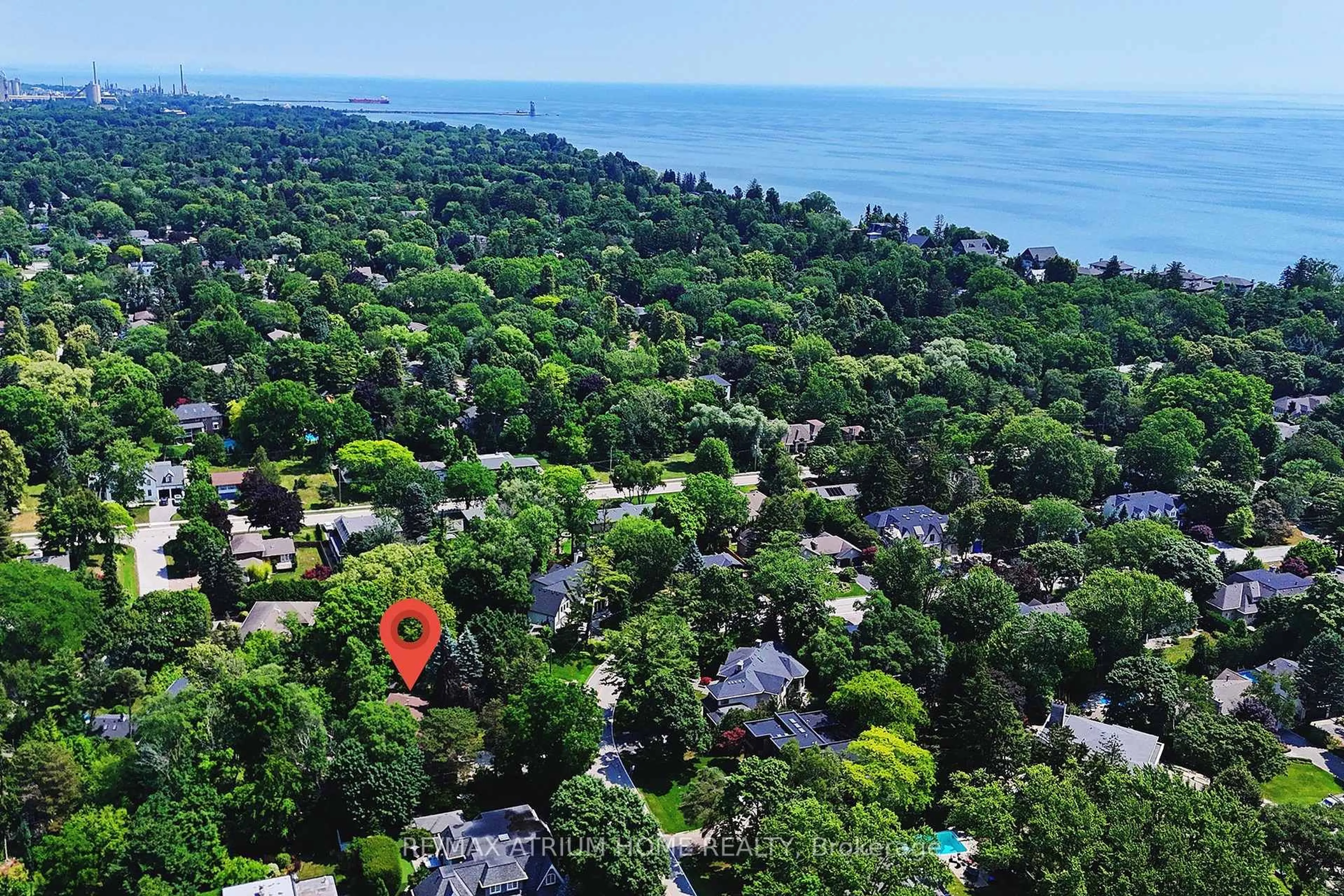 A pic from outside/outdoor area/front of a property/back of a property/a pic from drone, water/lake/river/ocean view for 223 Trelawn Ave, Oakville Ontario L6J 4R3