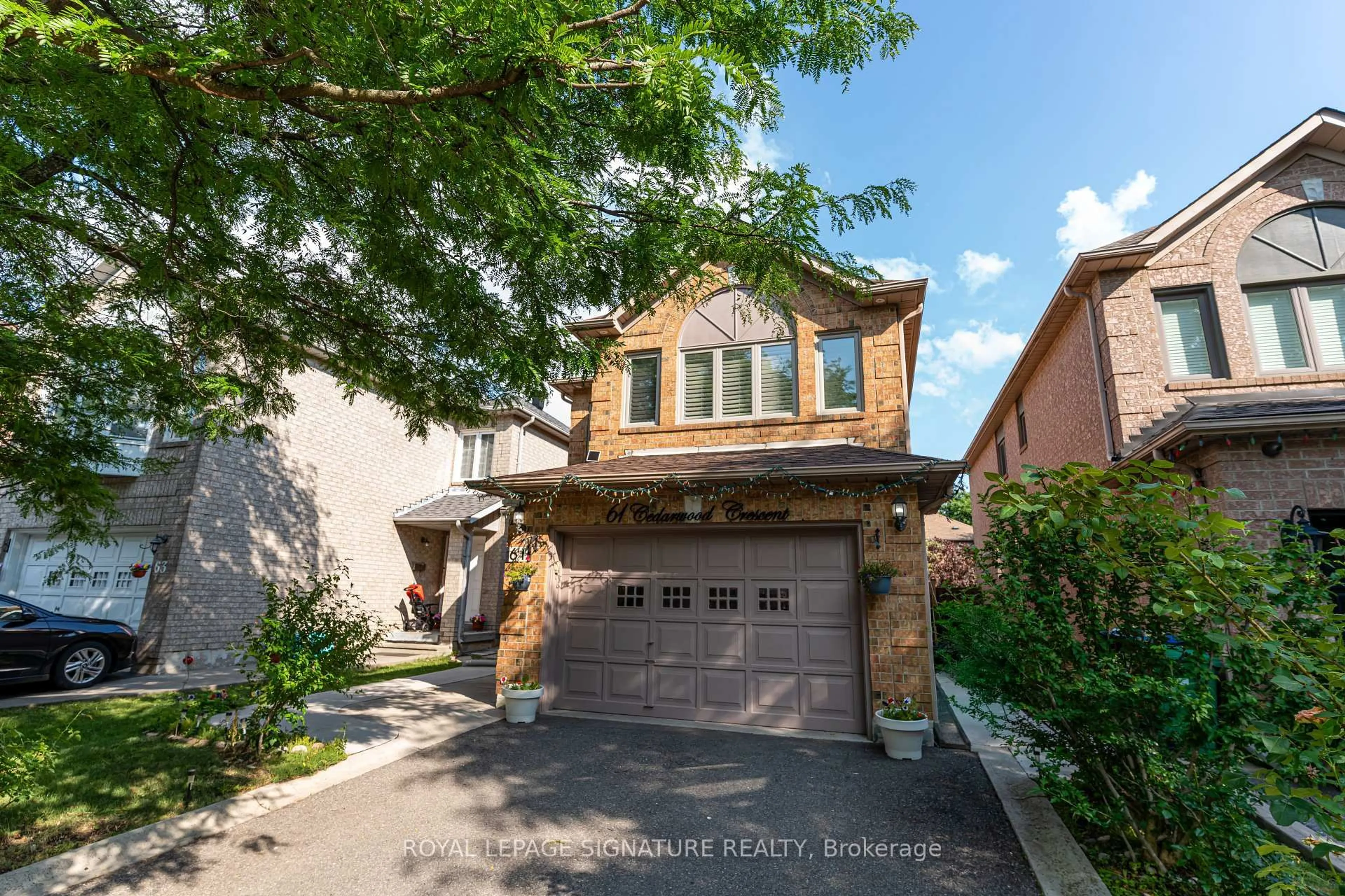 Home with brick exterior material, street for 61 Cedarwood Cres, Brampton Ontario L6X 4J9