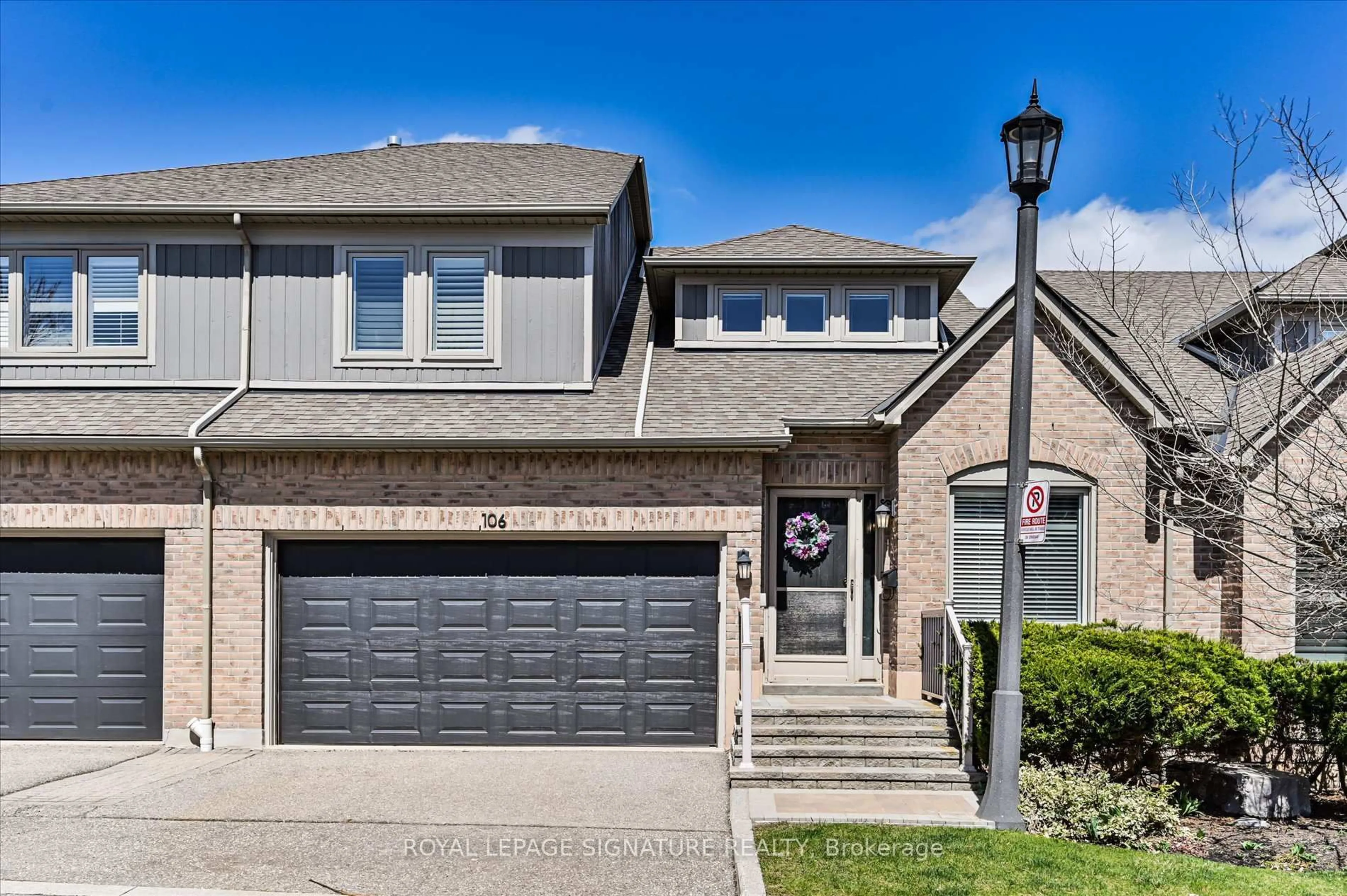 Home with brick exterior material, street for 5480 Glen Erin Dr #106, Mississauga Ontario L5M 5R3