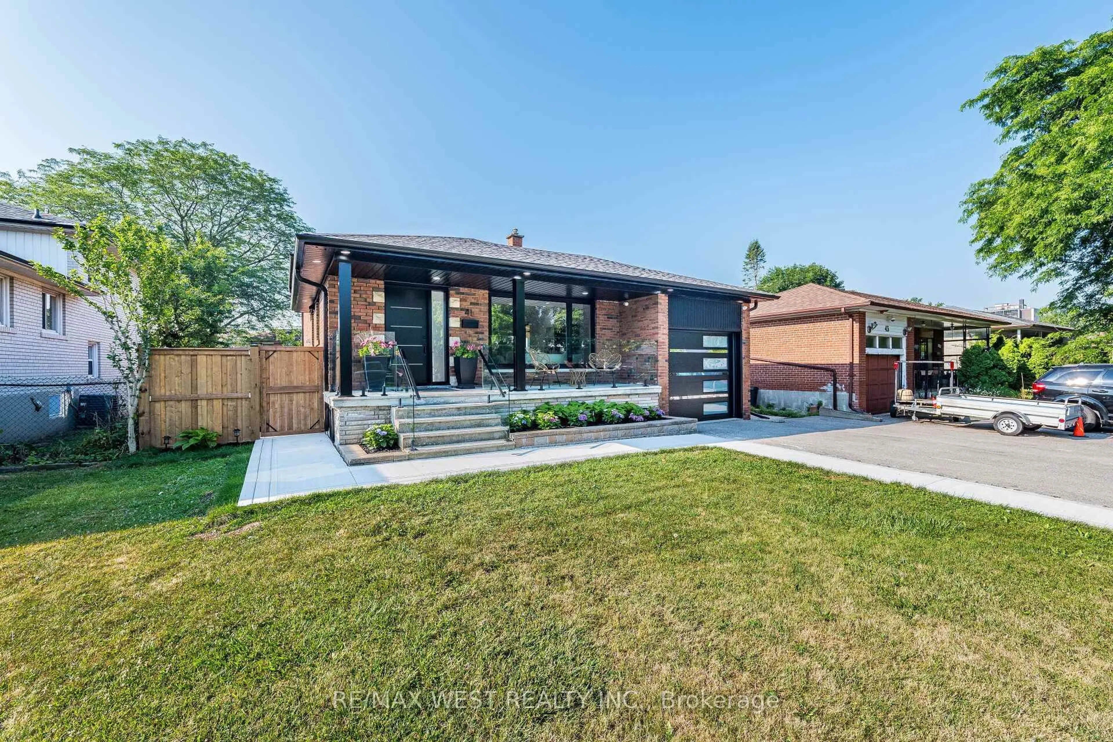 Home with brick exterior material, street for 41 Ladbrooke Rd, Toronto Ontario M9R 2B1