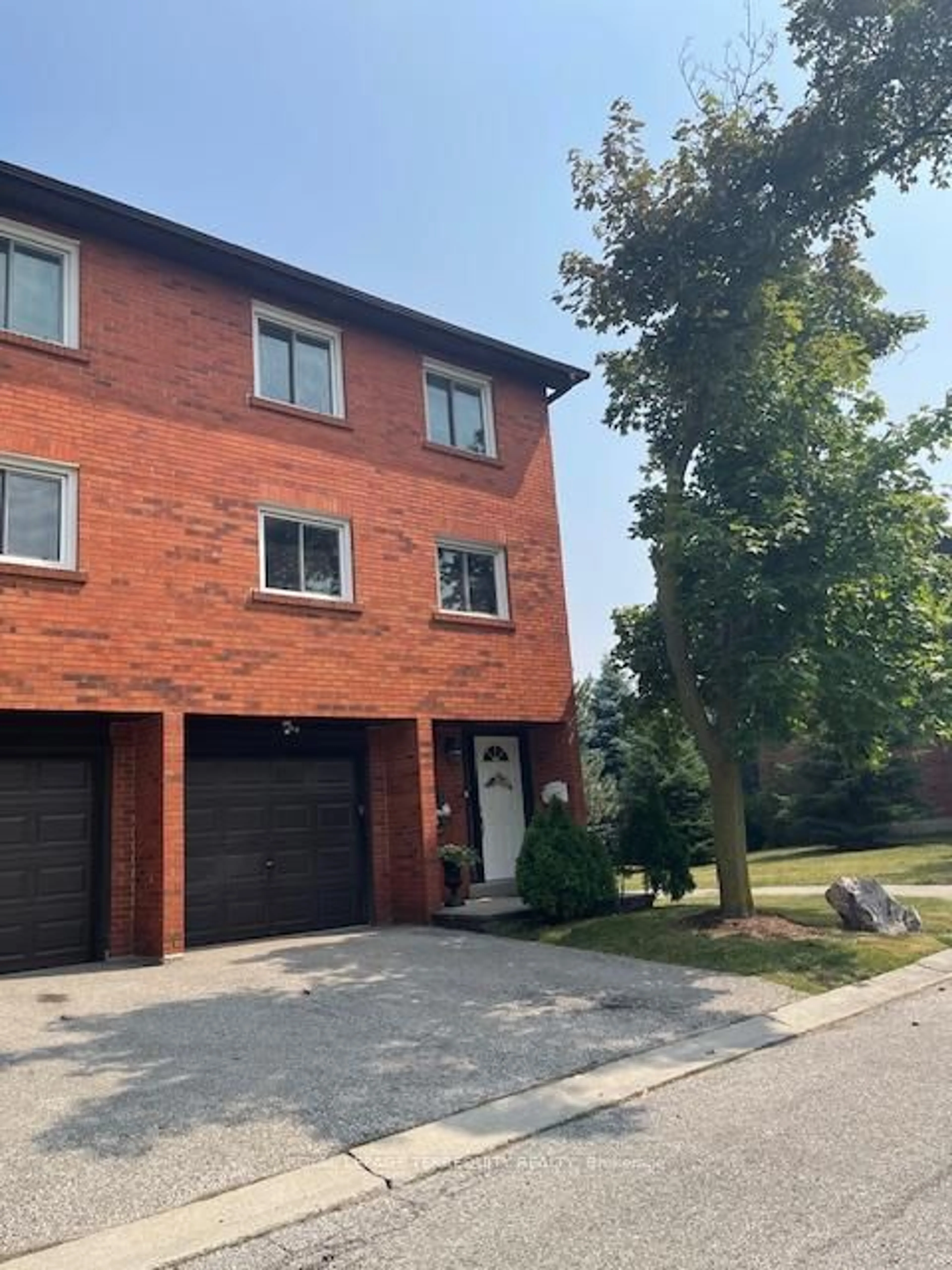 Home with brick exterior material, street for 1755 Rathburn Rd #56, Mississauga Ontario L4W 2M8