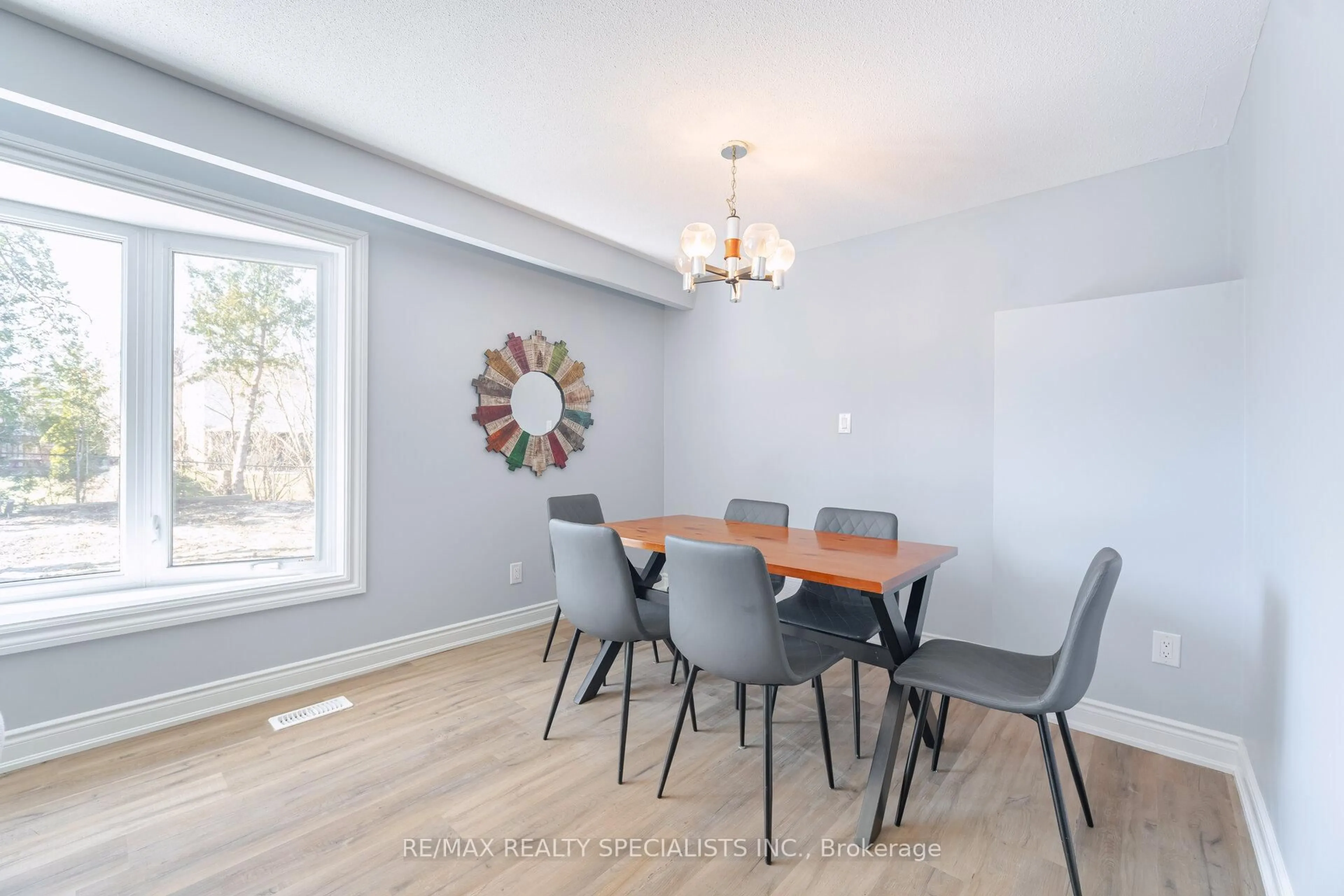 Dining room, wood/laminate floor for 13 Caledon Cres, Brampton Ontario L6W 1C6