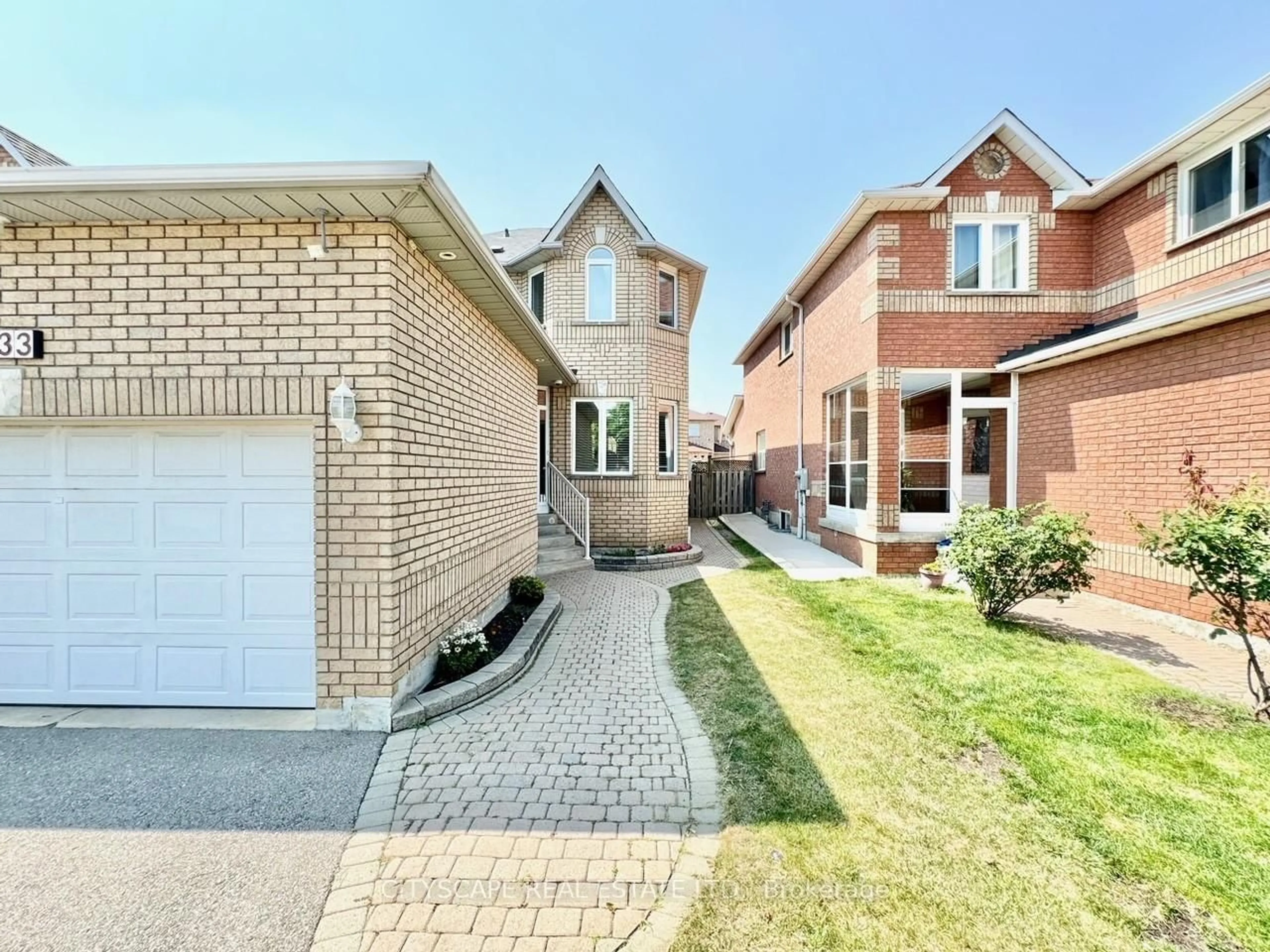 Home with brick exterior material, street for 533 Leatherleaf Dr, Mississauga Ontario L4Z 3Y5