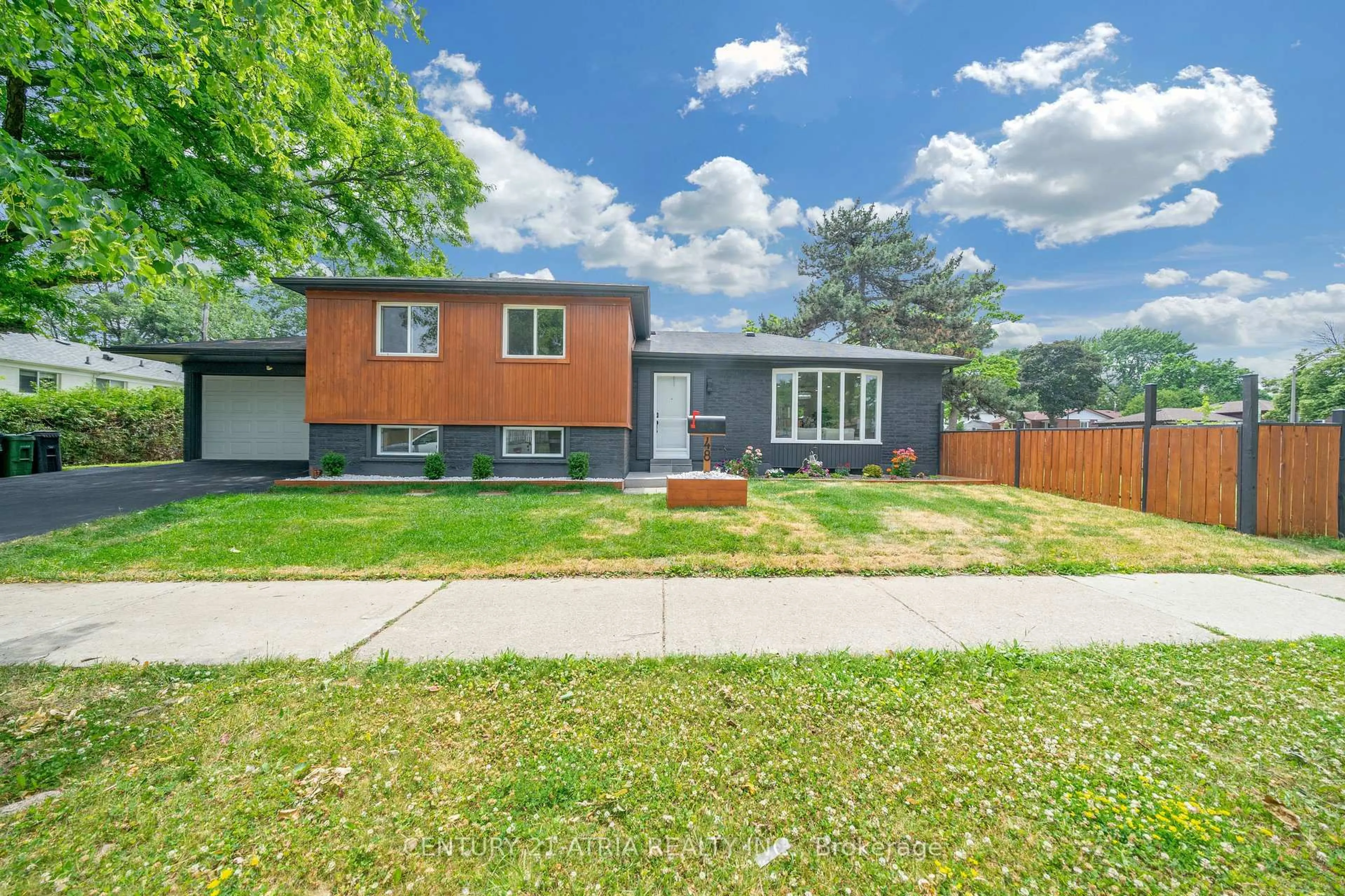 Home with brick exterior material, street for 48 Tealham Dr, Toronto Ontario M9V 3T6