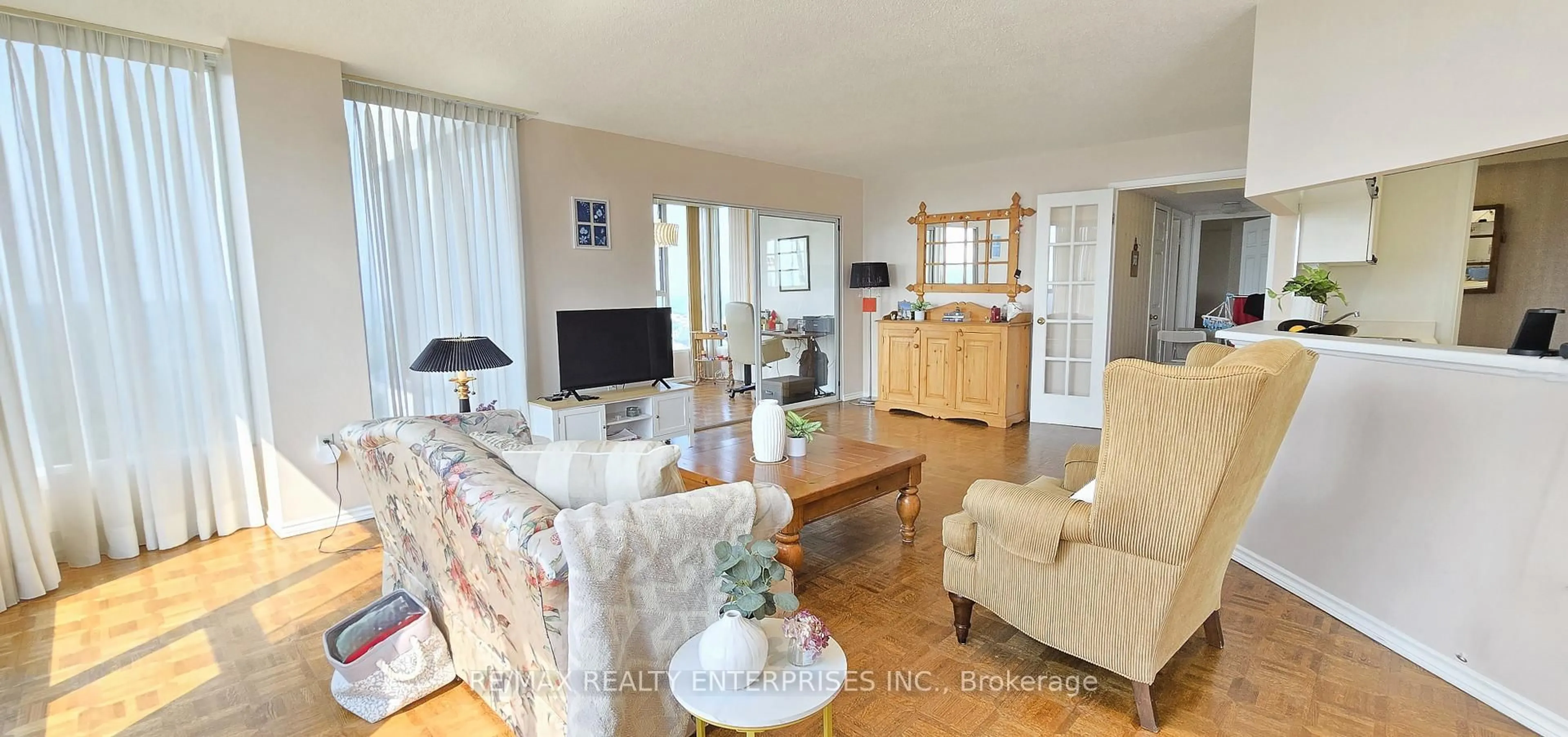 Living room with furniture, wood/laminate floor for 1271 Walden Circ #PH201, Mississauga Ontario L5J 4R4