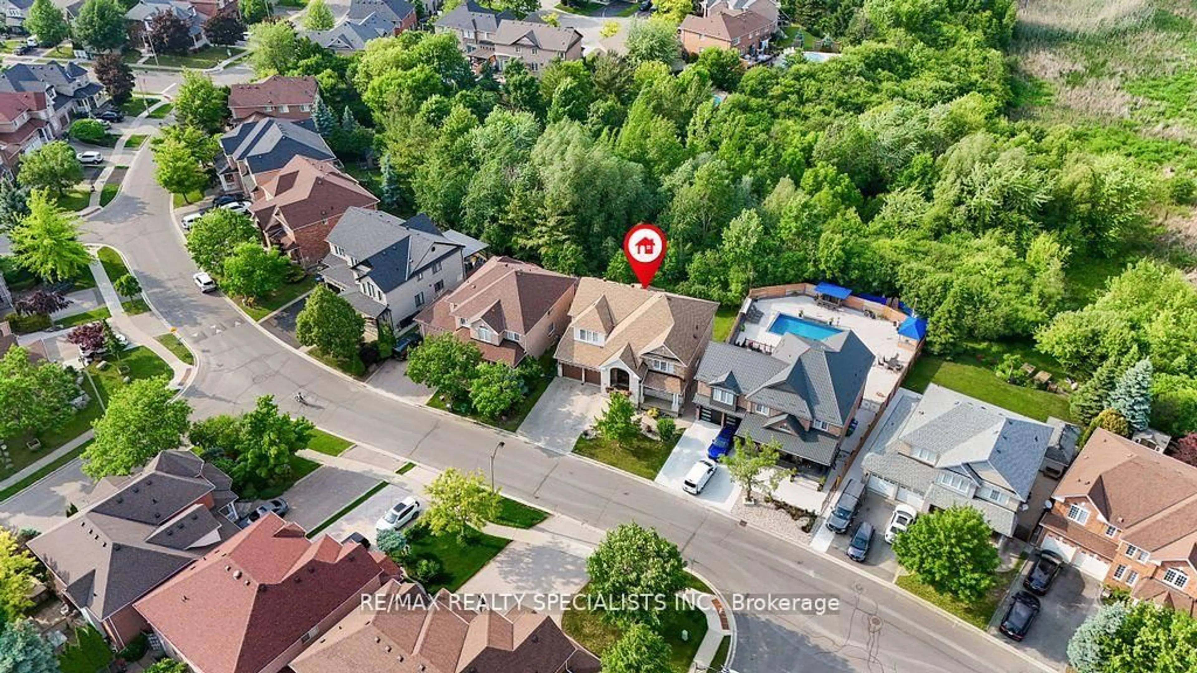 A pic from outside/outdoor area/front of a property/back of a property/a pic from drone, street for 104 Treeline Blvd, Brampton Ontario L6P 1A7