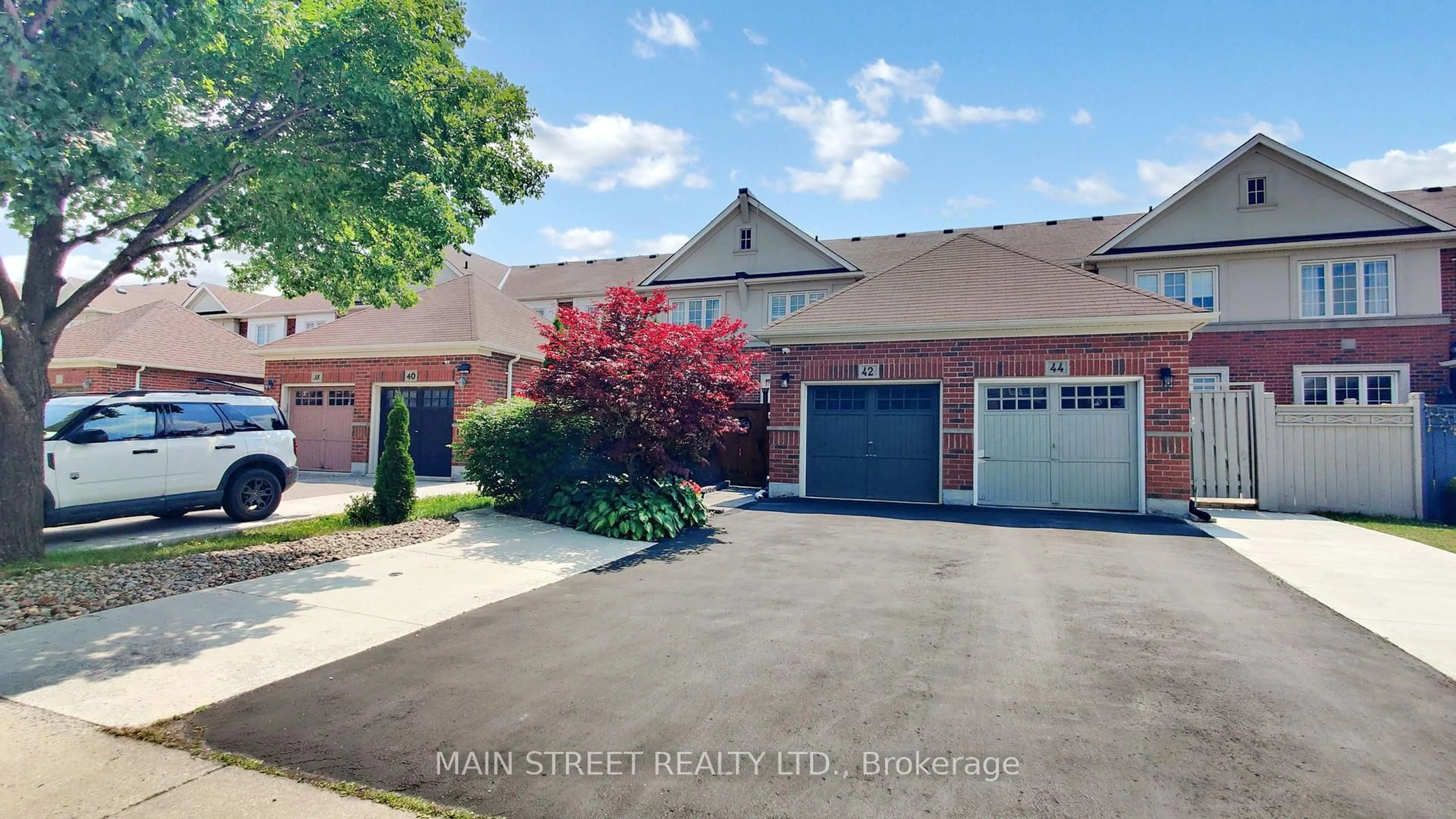 A pic from outside/outdoor area/front of a property/back of a property/a pic from drone, street for 42 Bellchase Tr, Brampton Ontario L6P 3K3