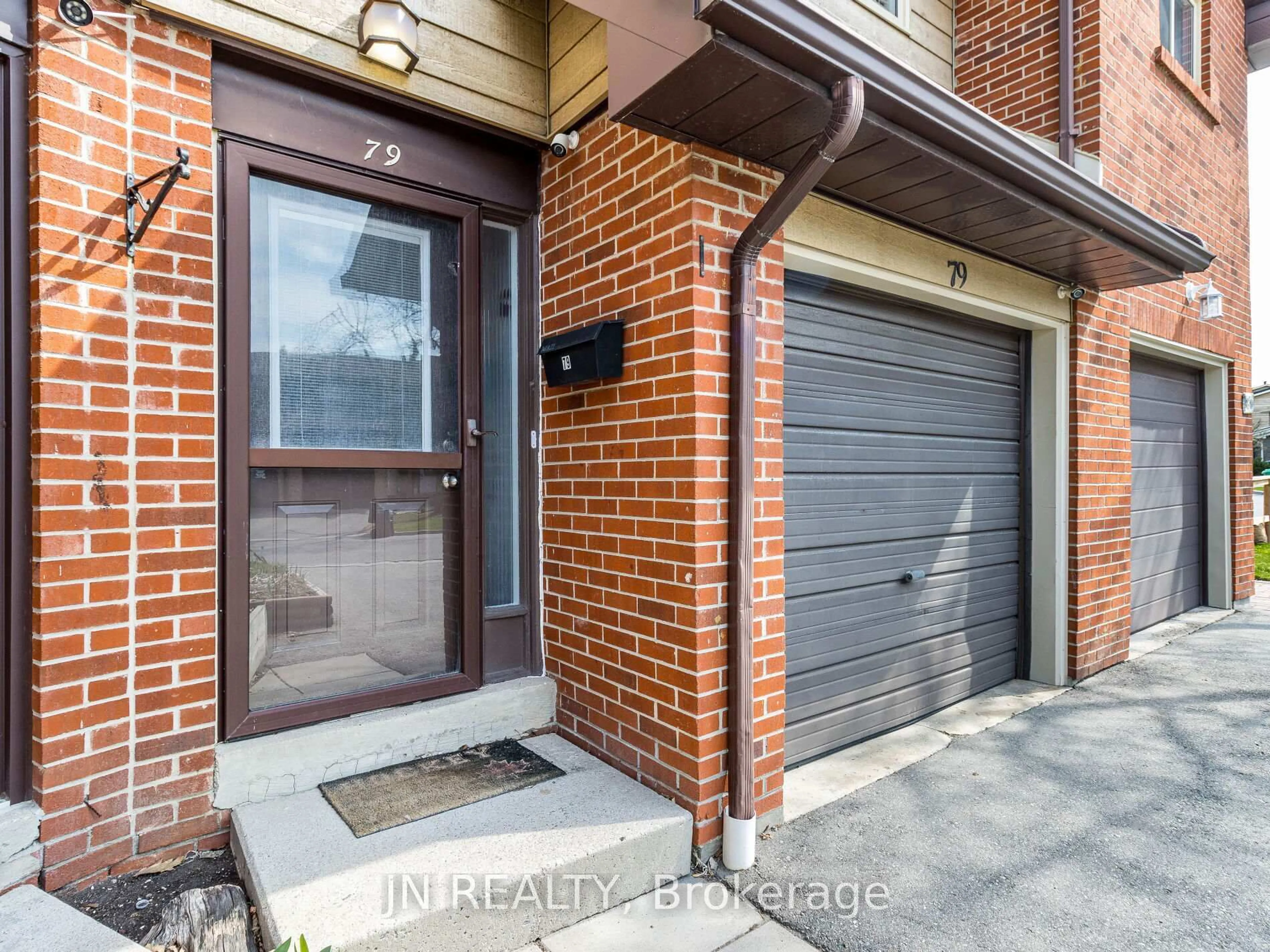 Home with brick exterior material, street for 79 Foster Cres #79, Brampton Ontario L6V 3M8