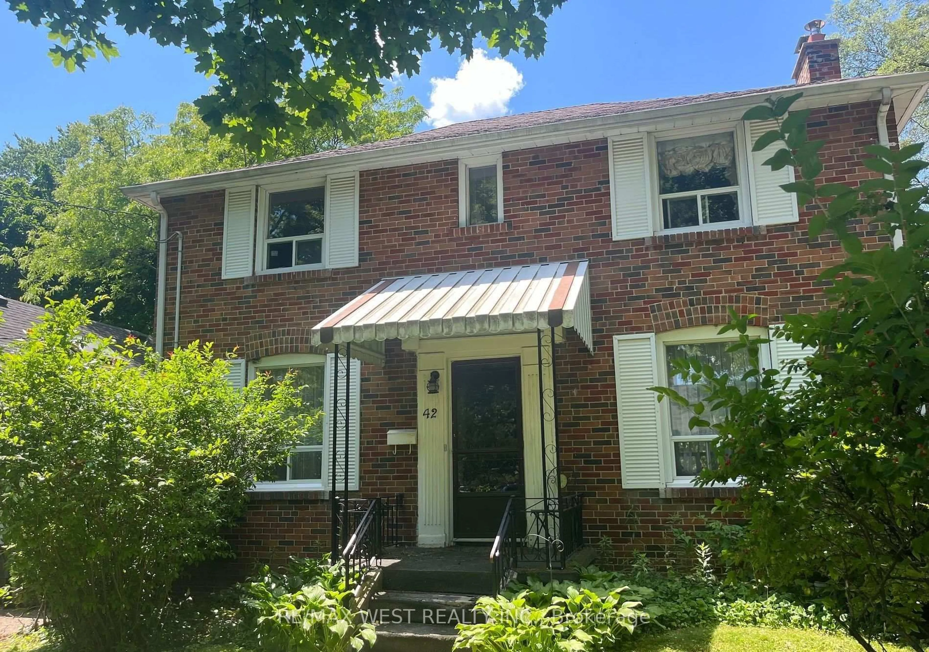 Home with brick exterior material, street for 42 Highgate Rd, Toronto Ontario M8X 2B3