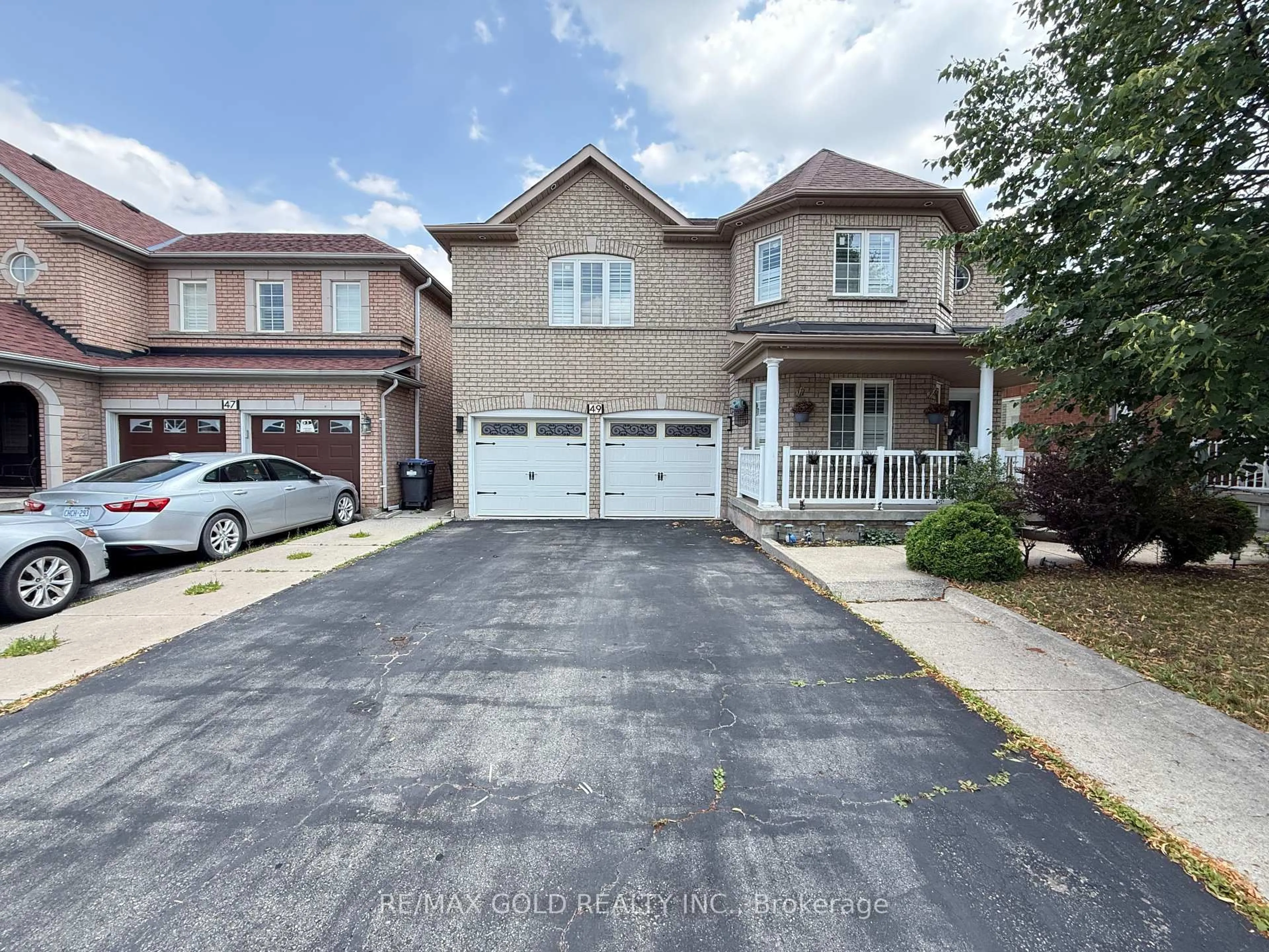 Home with brick exterior material, street for 49 Australia Dr, Brampton Ontario L6R 3E9