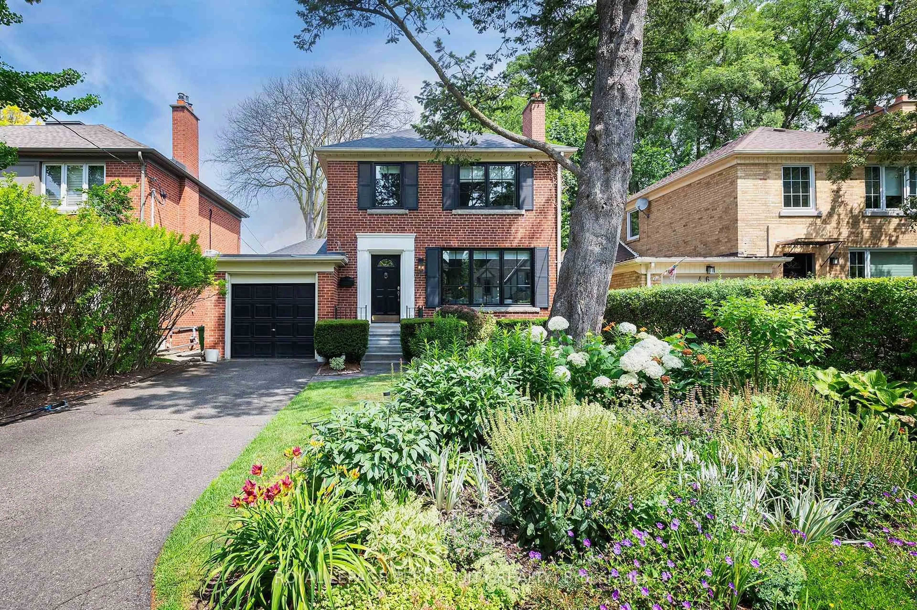 Home with brick exterior material, street for 48 Winston Grove, Toronto Ontario M8Y 2K9