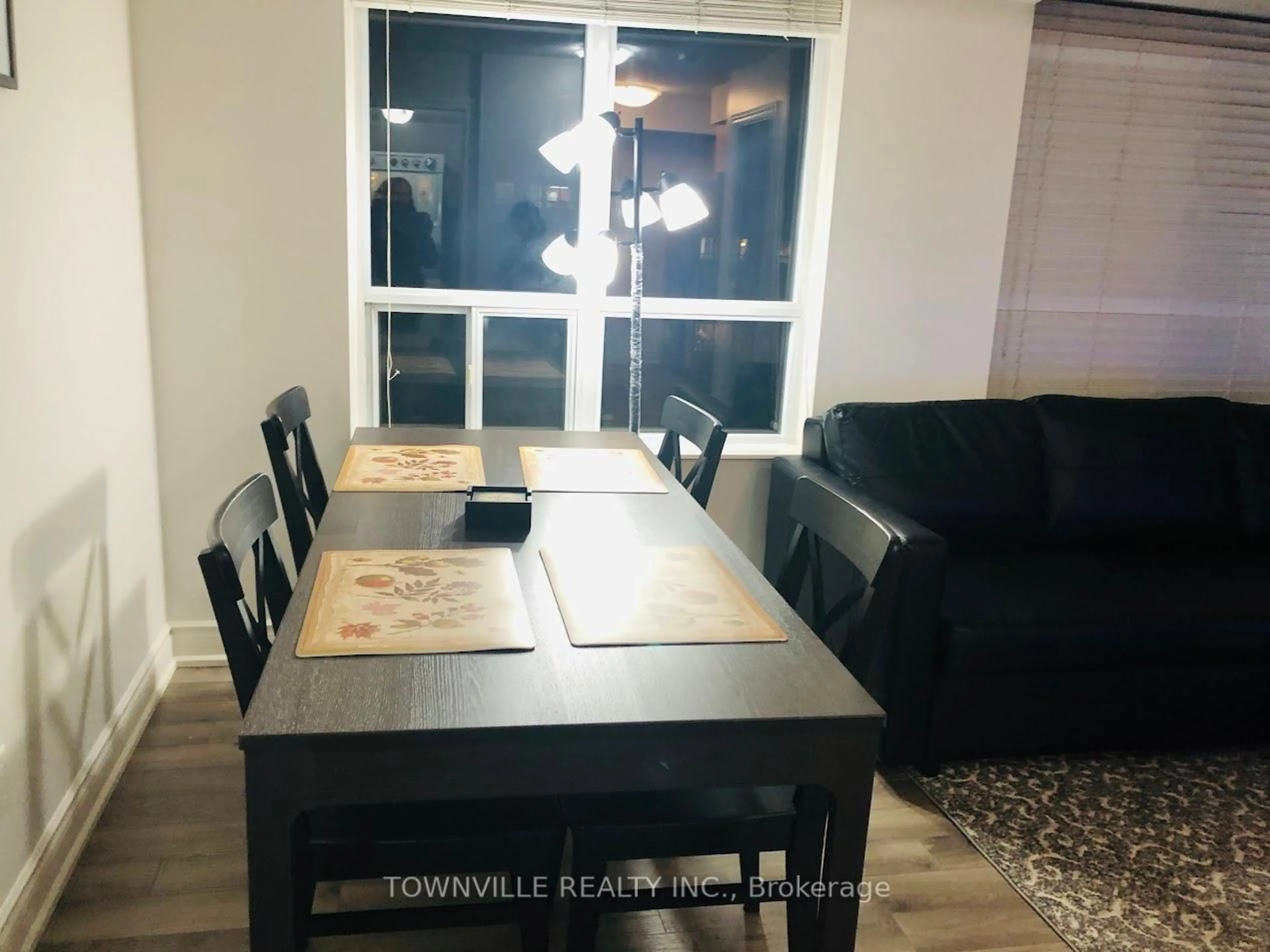 Dining room, wood/laminate floor for 310 Burnhamthorpe Rd #1912, Mississauga Ontario L5B 4P9