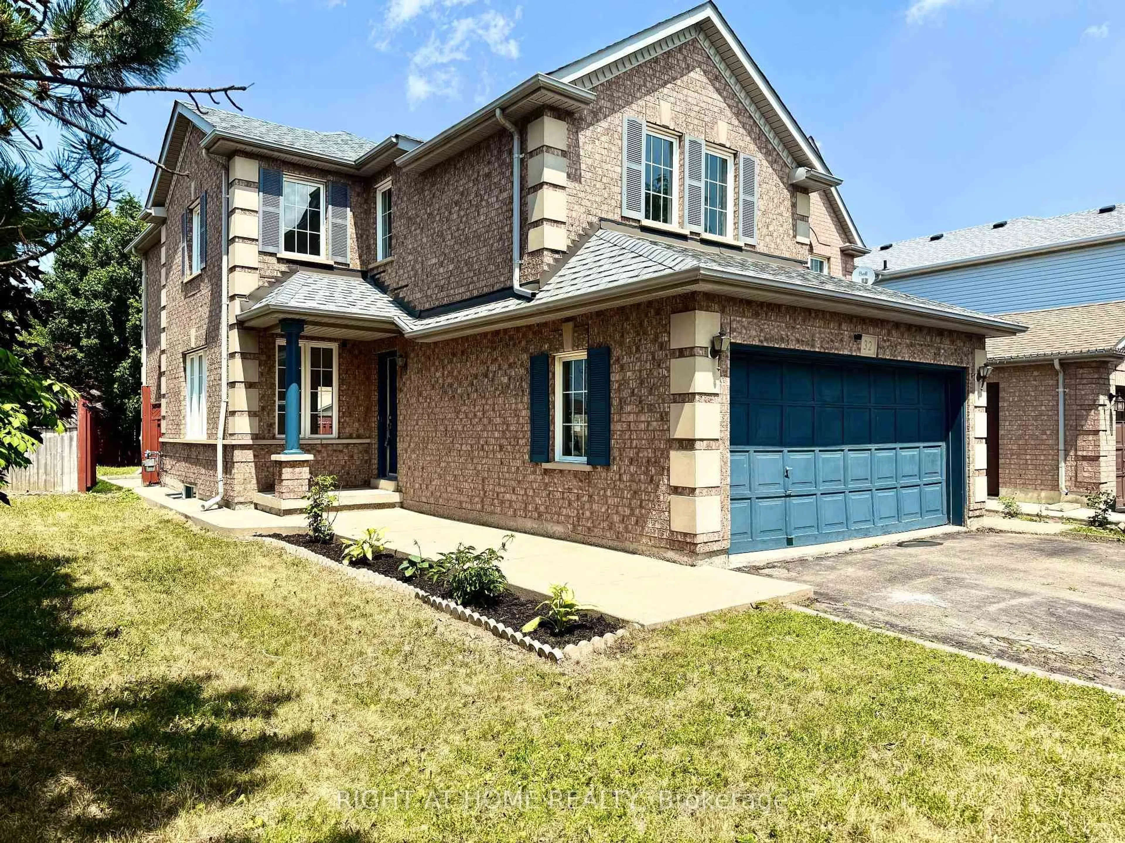 Home with brick exterior material, street for 32 Hocken Crt, Brampton Ontario L6R 2T7