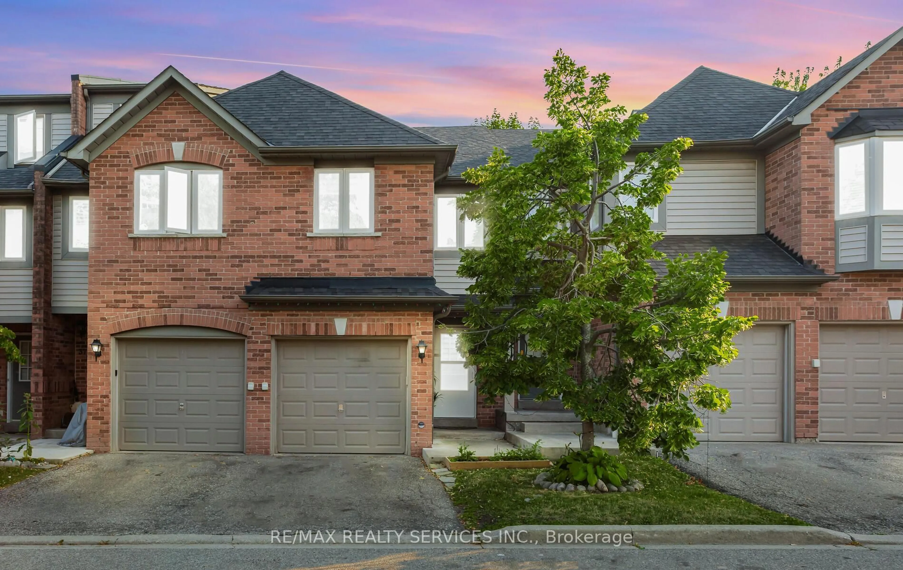 Home with brick exterior material, street for 180 Forum Dr #36, Mississauga Ontario L4Z 3Y2