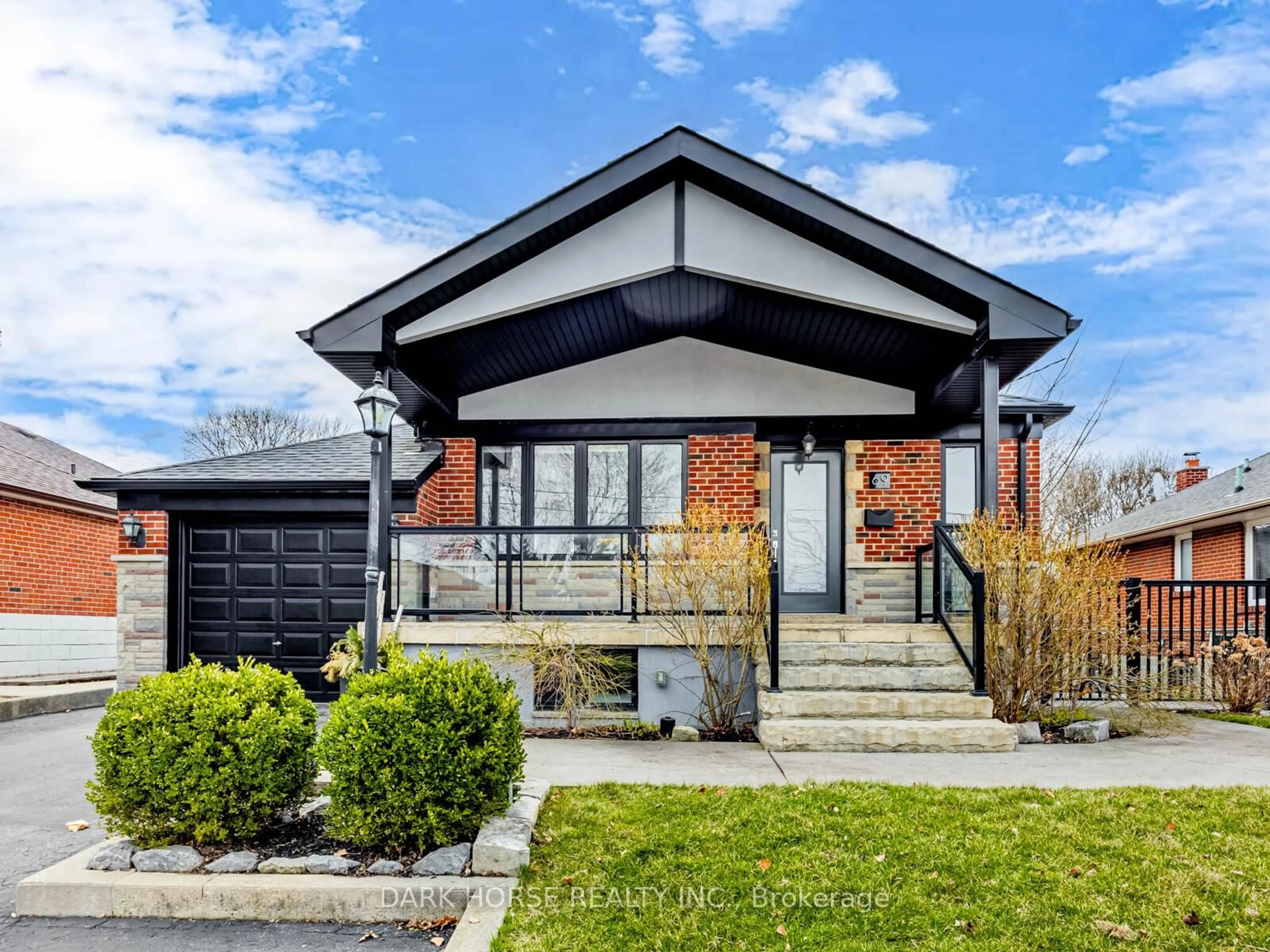 Home with brick exterior material, street for 69 Tavistock Rd, Toronto Ontario M3M 2N8