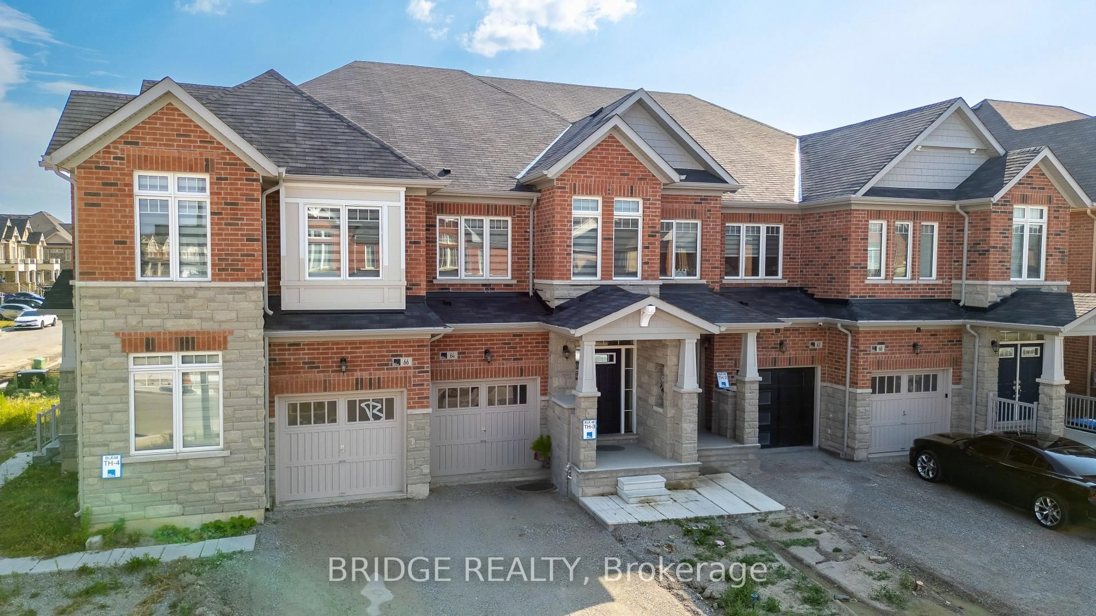 Home with brick exterior material, building for 64 Tundra Rd, Caledon Ontario L7C 4G9