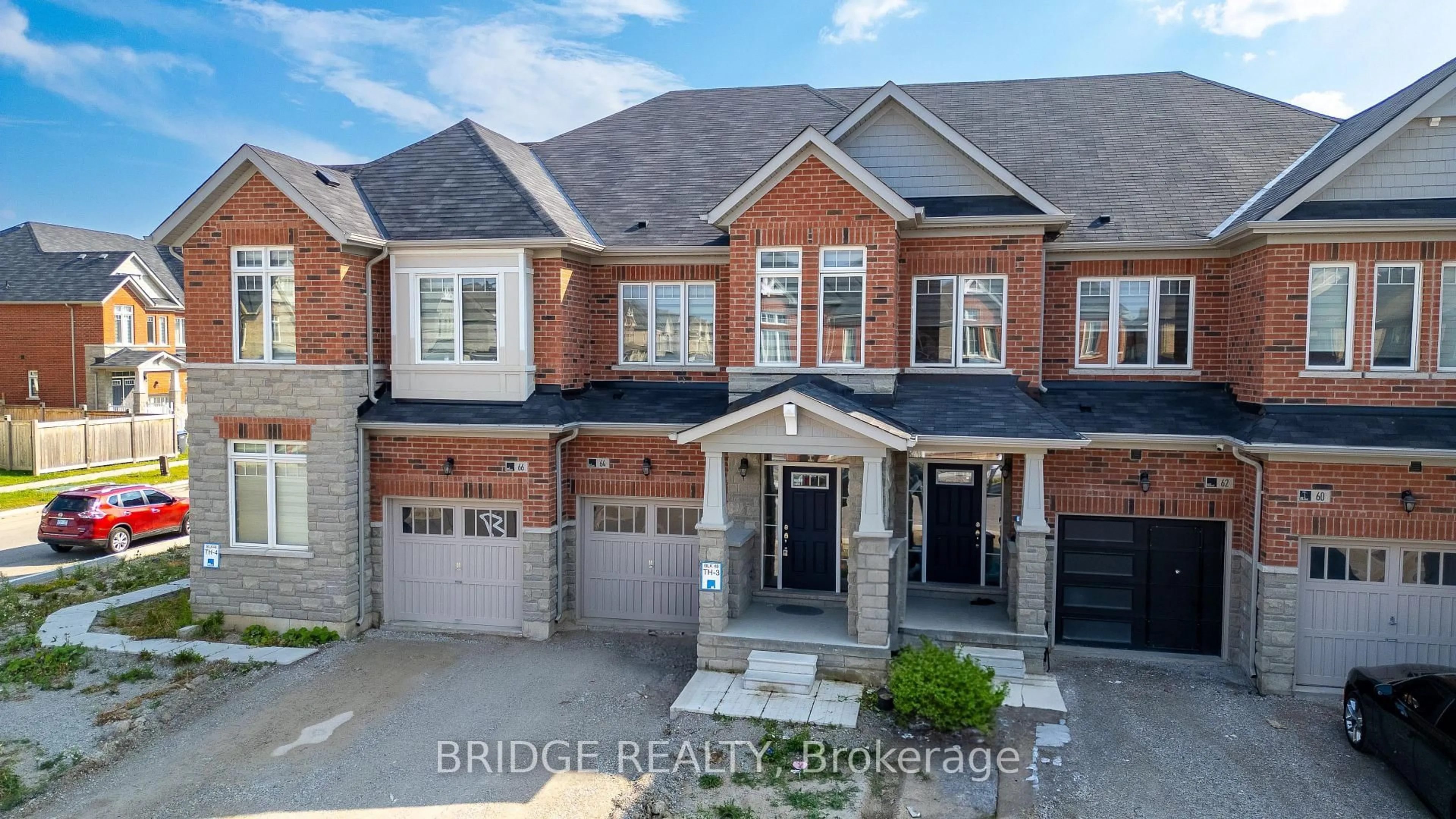 Home with brick exterior material, street for 64 Tundra Rd, Caledon Ontario L7C 4G9