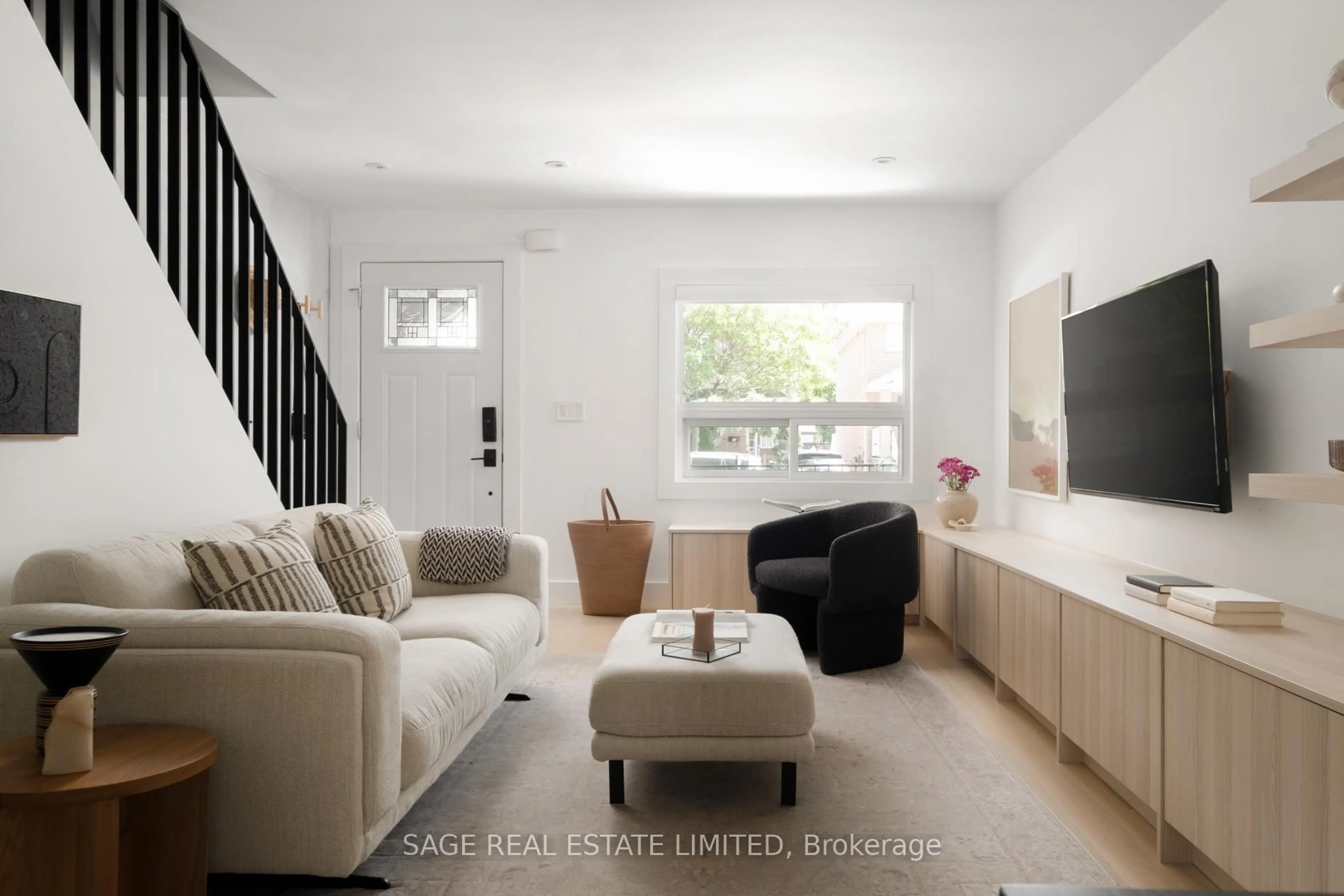 Living room with furniture, wood/laminate floor for 66 Rosethorn Ave, Toronto Ontario M6N 3K8