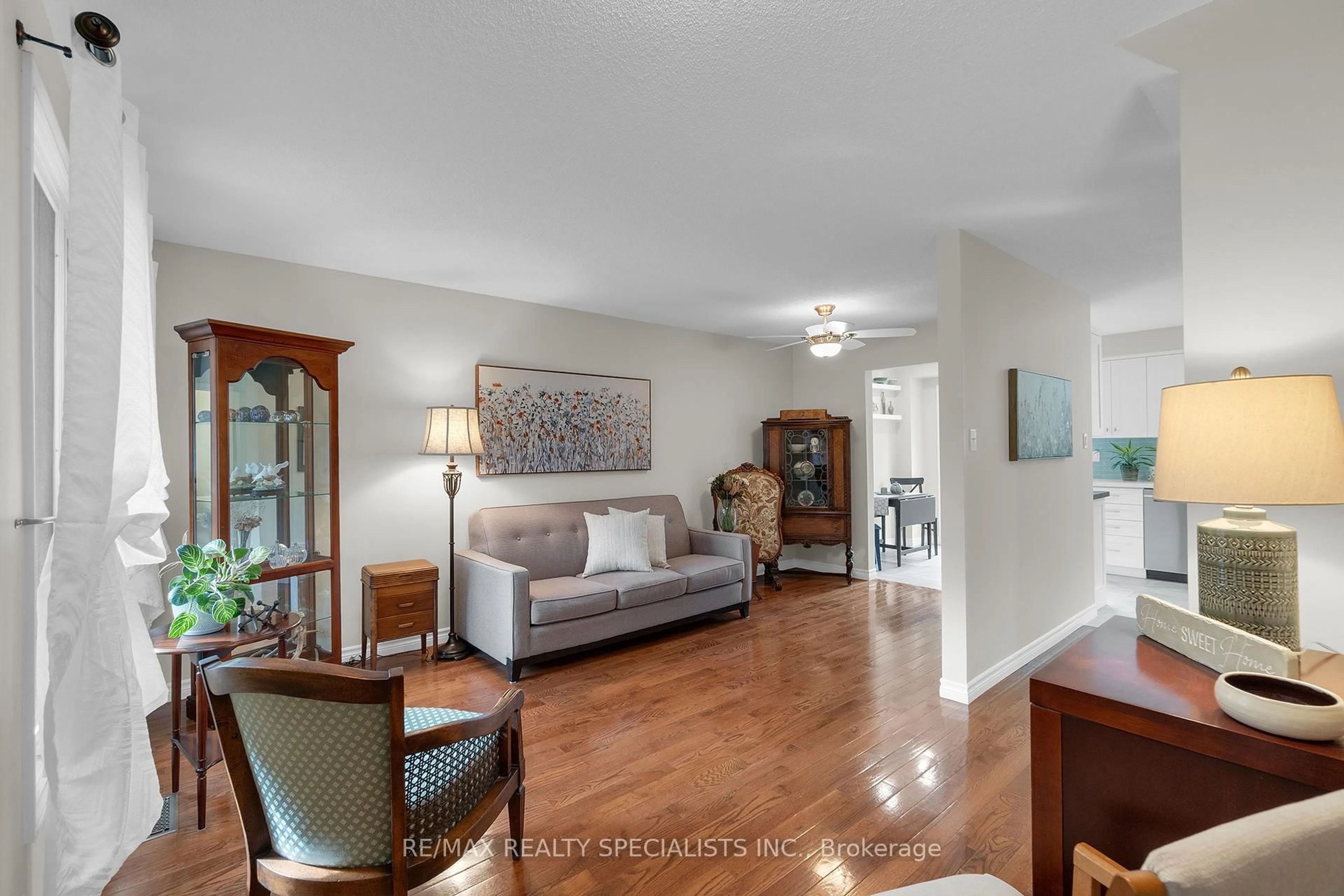 Living room with furniture, unknown for 64 Maplehurst Sq, Brampton Ontario L6Z 1J6