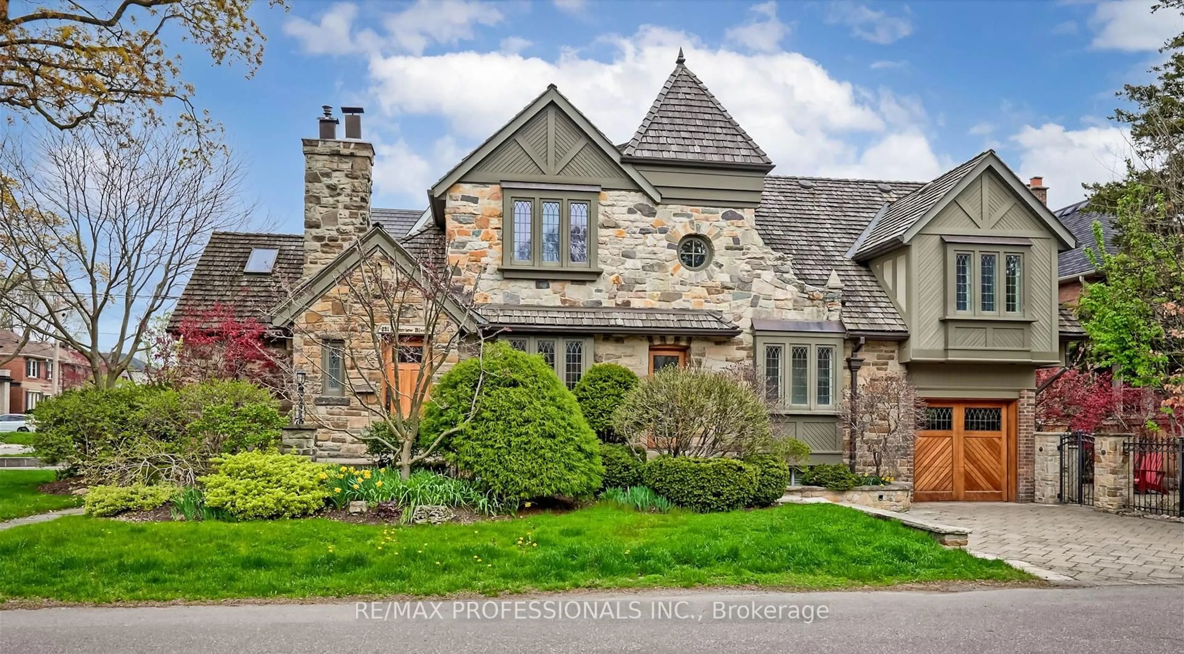 Home with brick exterior material, street for 231 Grenview Blvd, Toronto Ontario M8Y 3V2