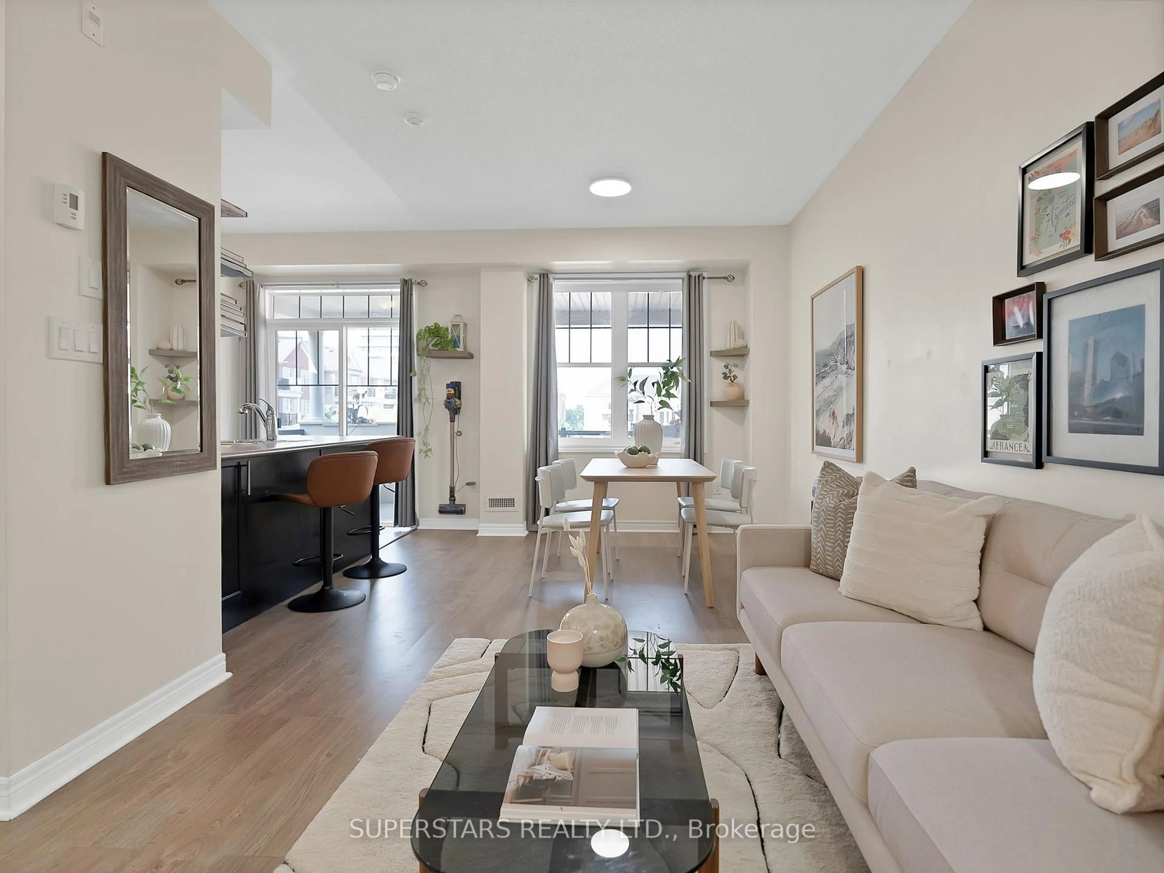 Living room with furniture, unknown for 2333 Sawgrass Dr #201, Oakville Ontario L6H 0L2