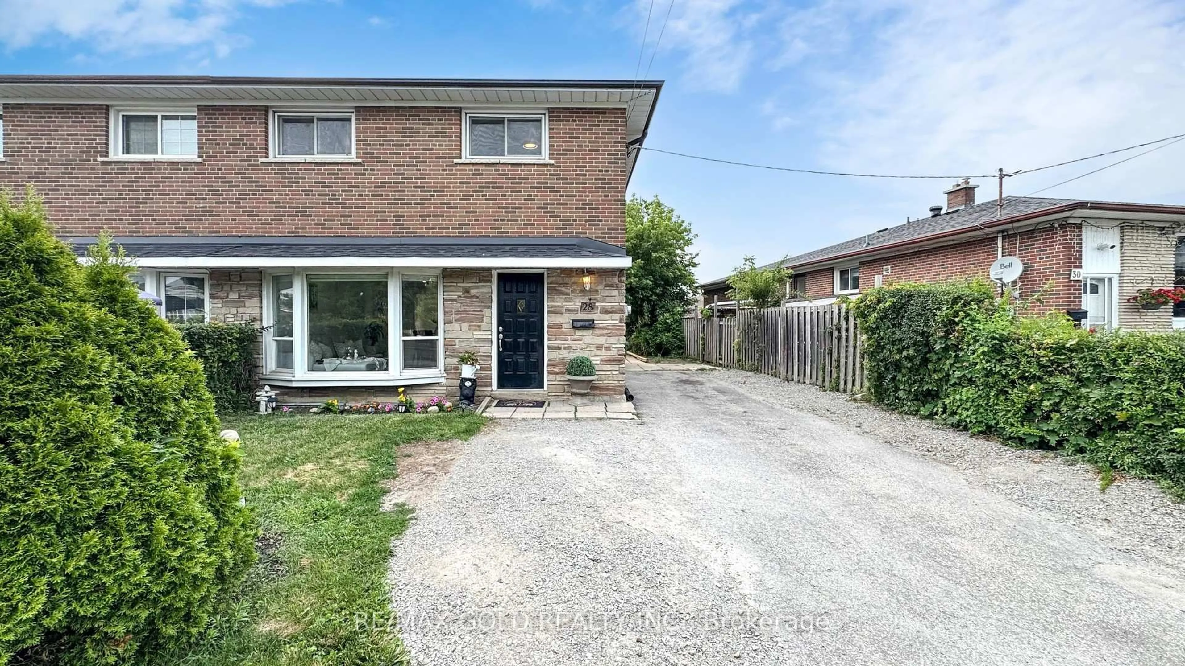 Home with brick exterior material, street for 28 Navenby Cres, Toronto Ontario M9L 1B2