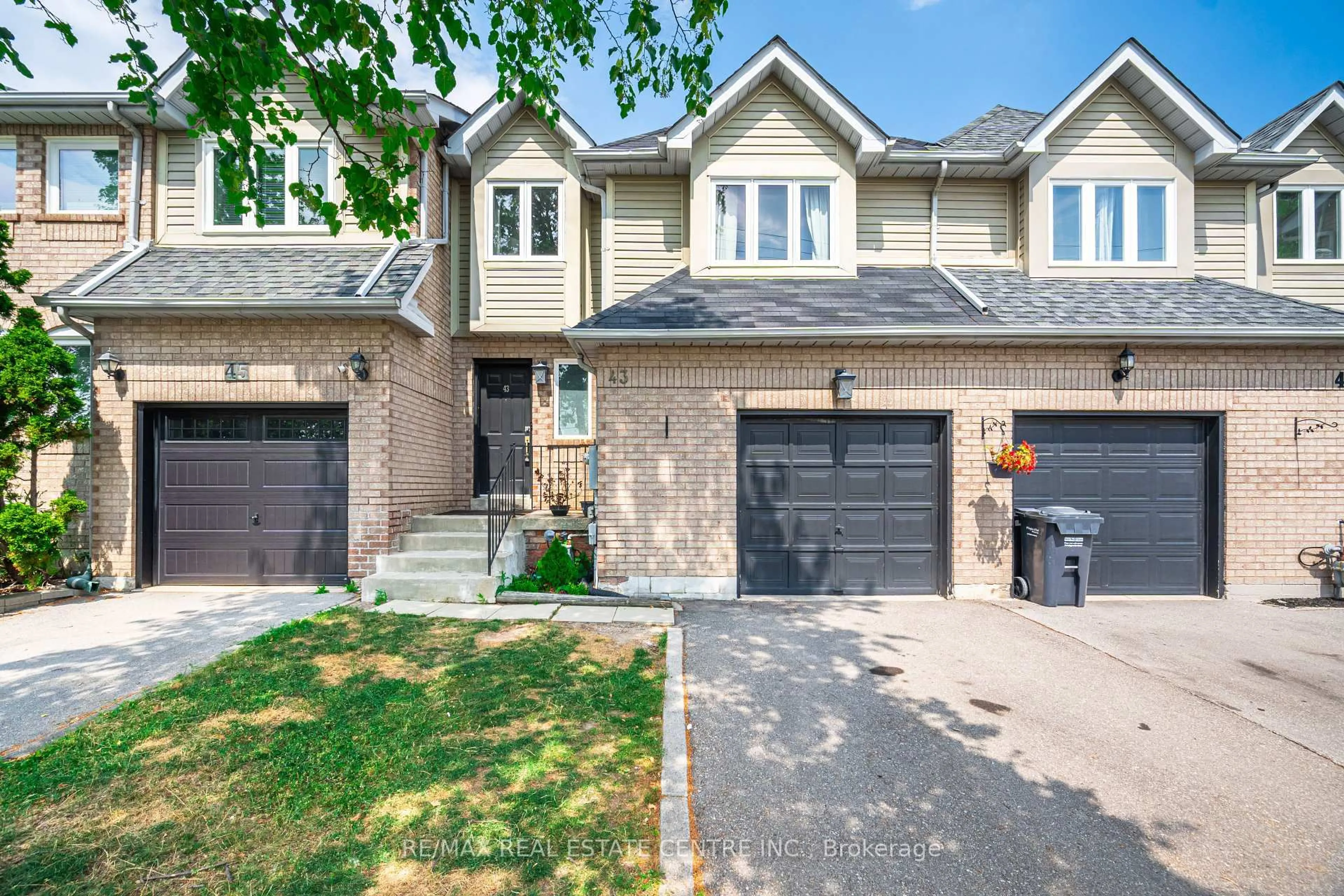 Home with brick exterior material, street for 43 Ashbrook Way, Brampton Ontario L6Y 4R4
