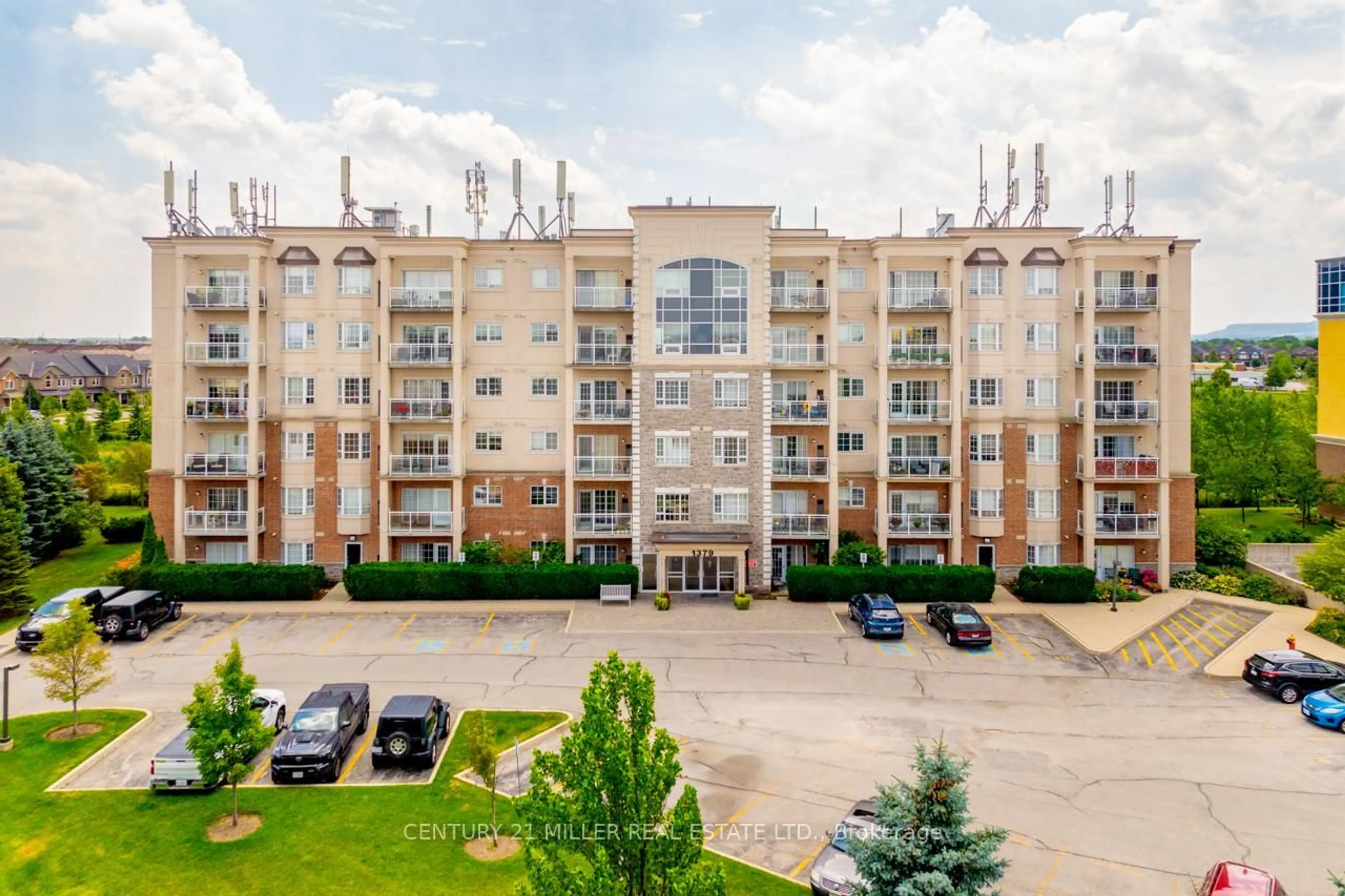A pic from outside/outdoor area/front of a property/back of a property/a pic from drone, unknown for 1379 Costigan Rd #408, Milton Ontario L9T 2K6