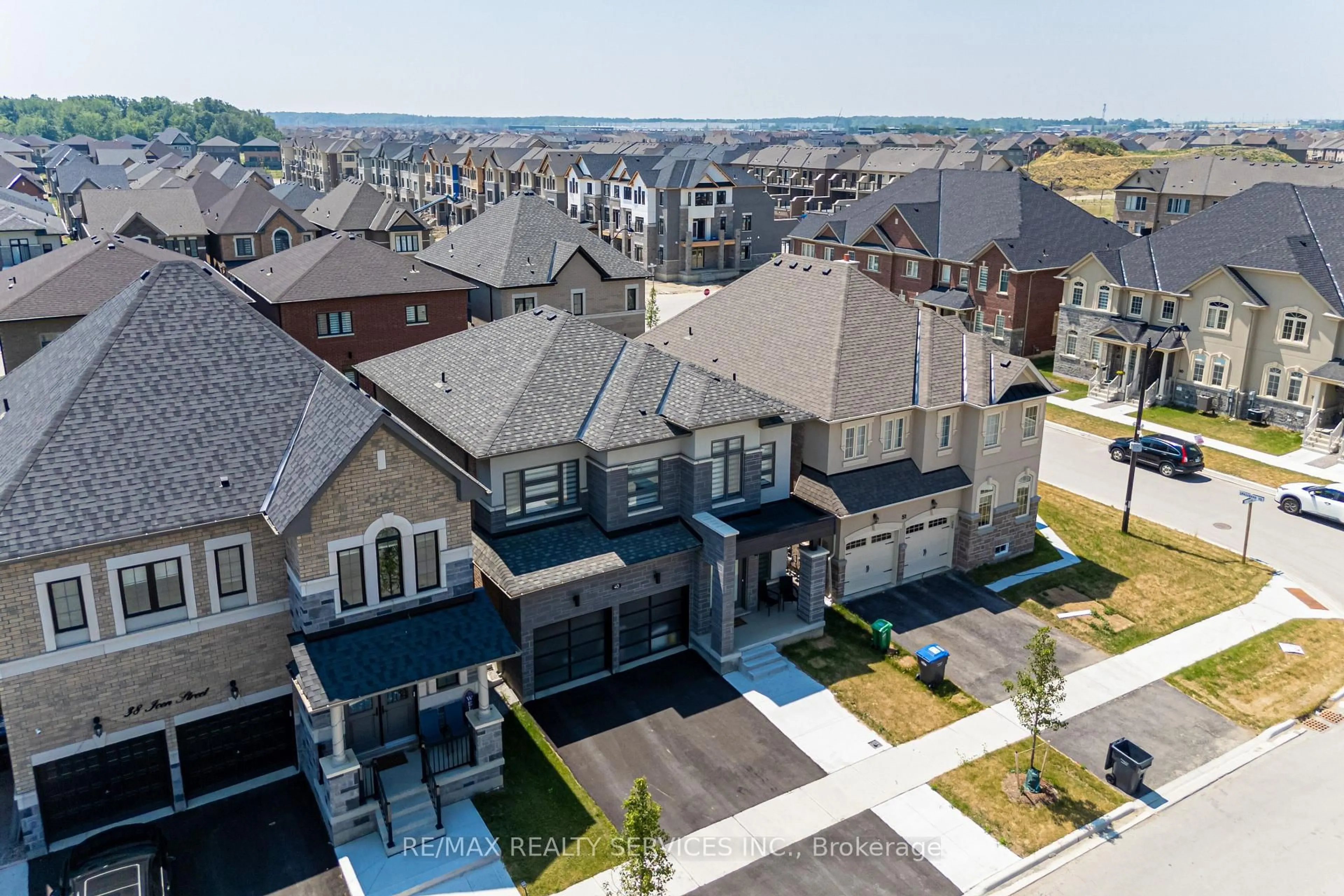 A pic from outside/outdoor area/front of a property/back of a property/a pic from drone, unknown for 40 Icon St, Brampton Ontario L6R 4E5