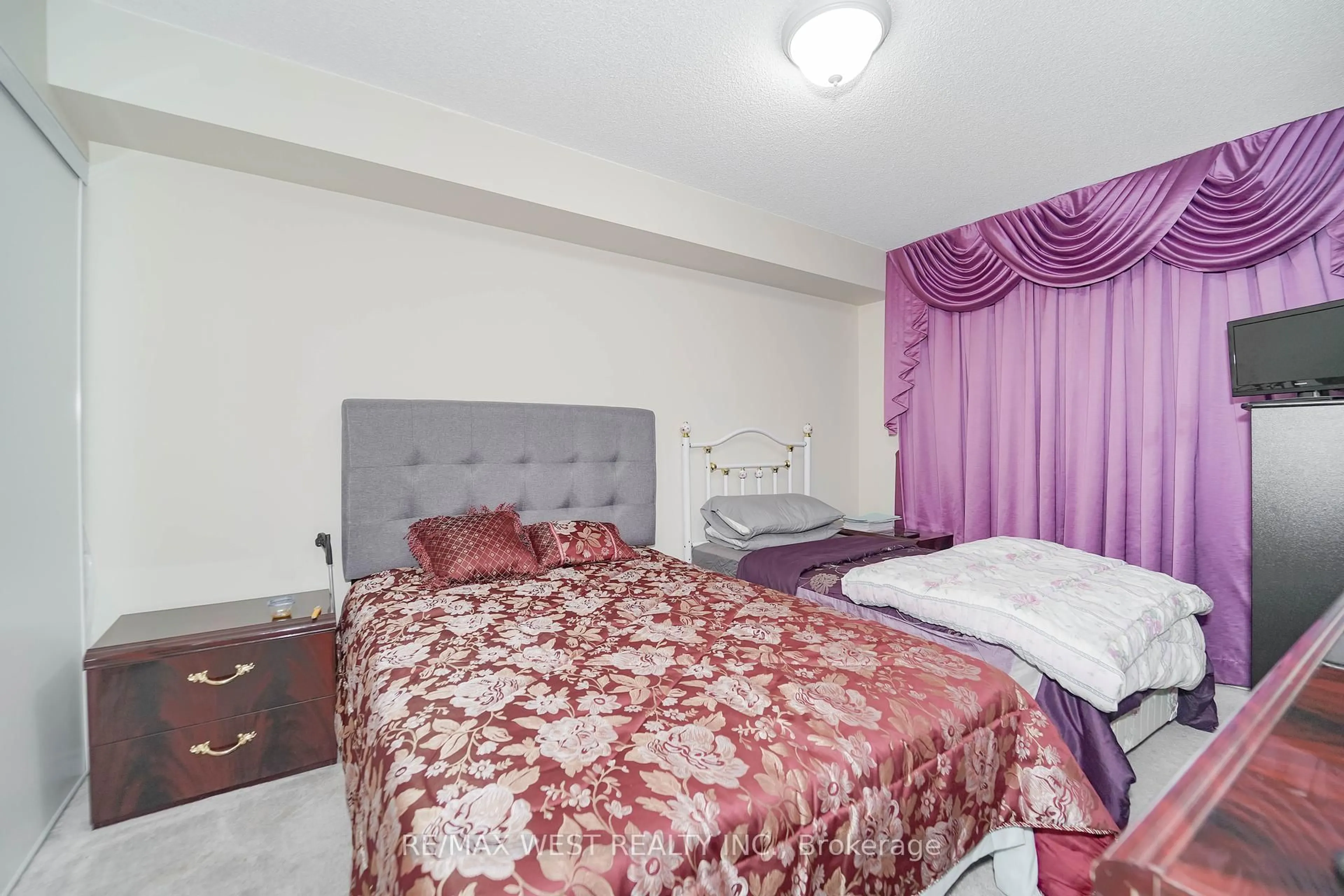 Bedroom with bed, carpet floor for 700 Humberwood Blvd #223, Toronto Ontario M9W 7J4